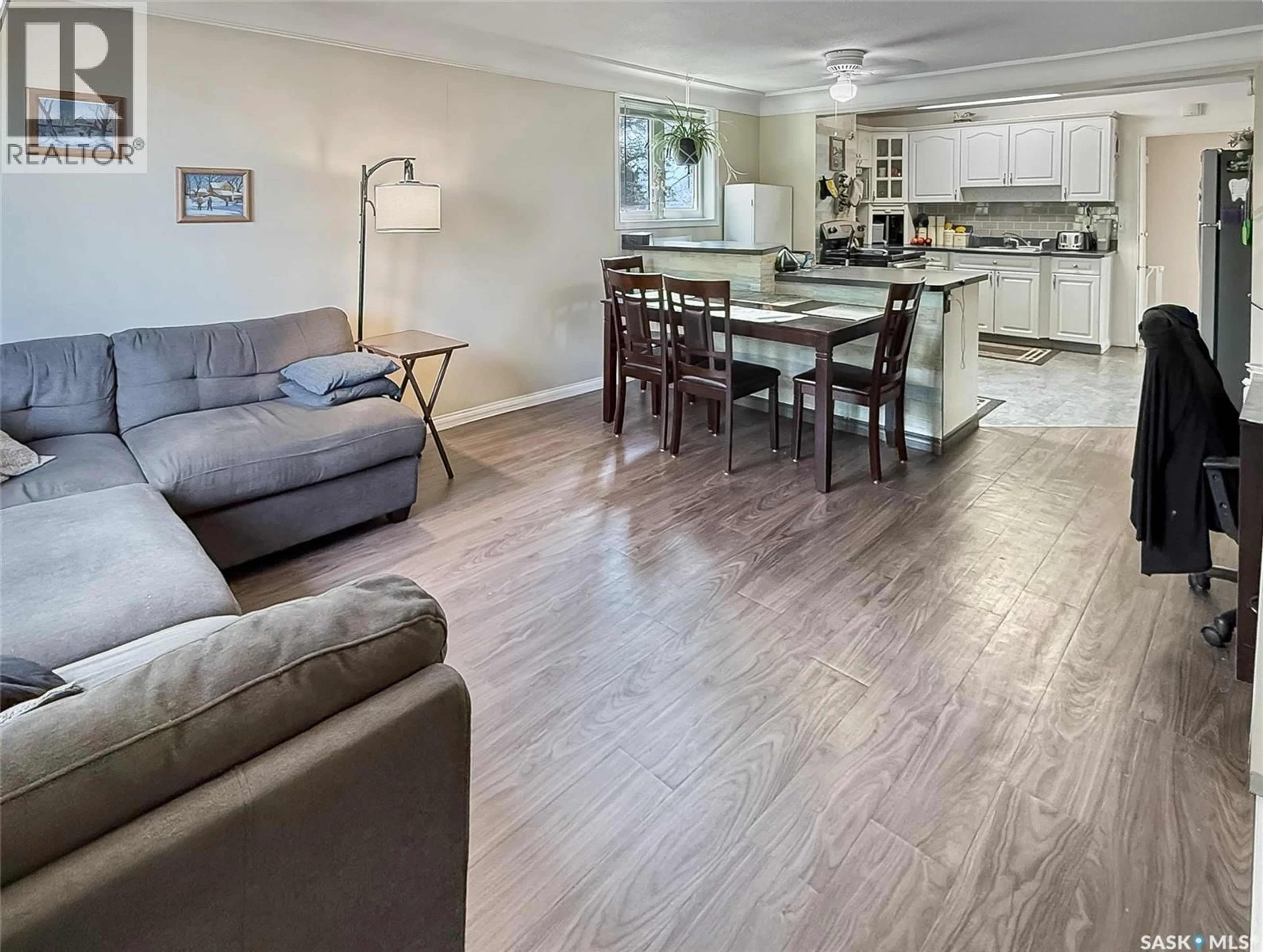 Open concept kitchen, wood/laminate floor for 520 CENTRAL AVENUE, Swift Current Saskatchewan S9H0L9