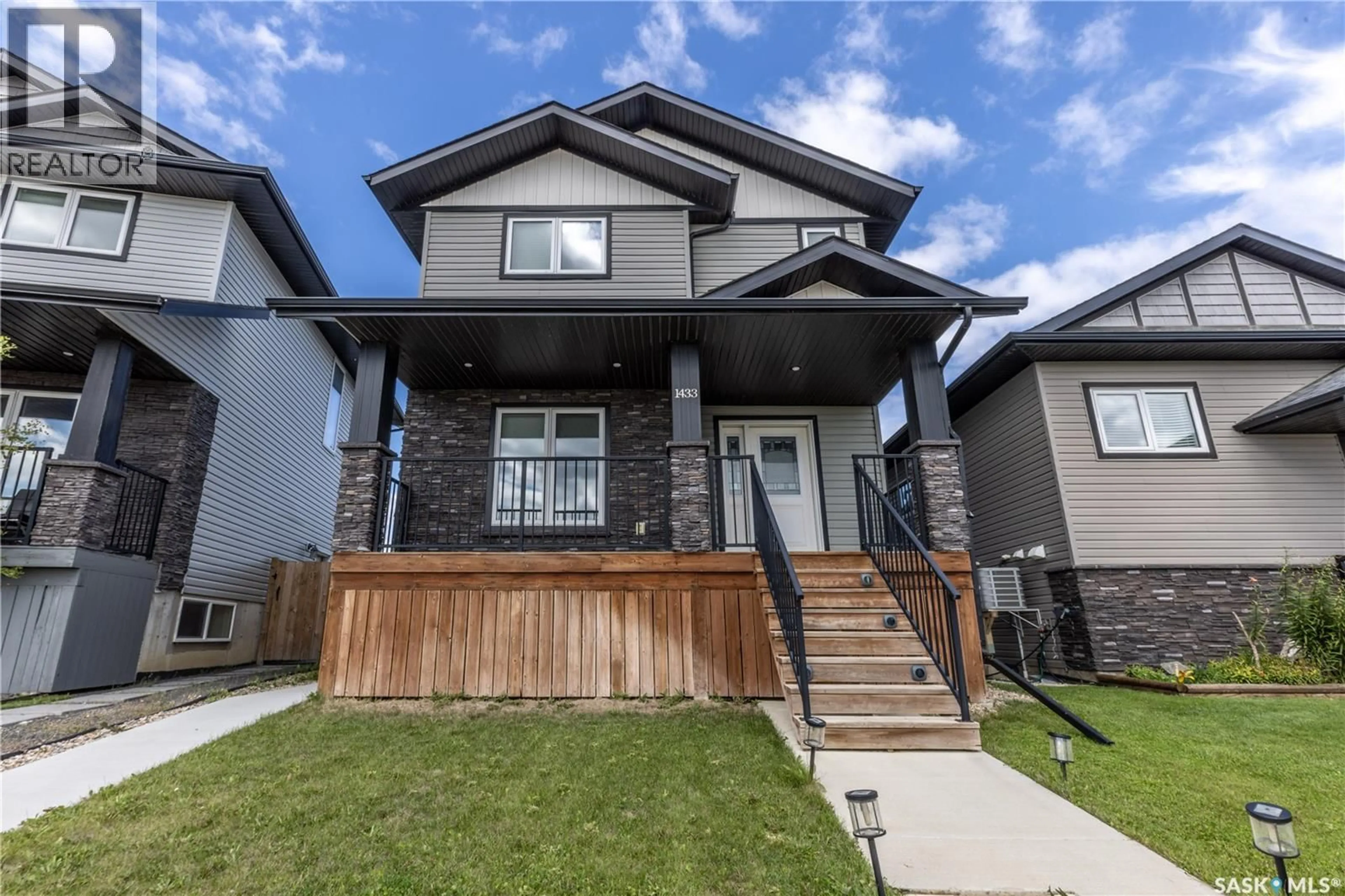 Home with vinyl exterior material, street for 1433 BESNARD DRIVE, Martensville Saskatchewan S0K2T1