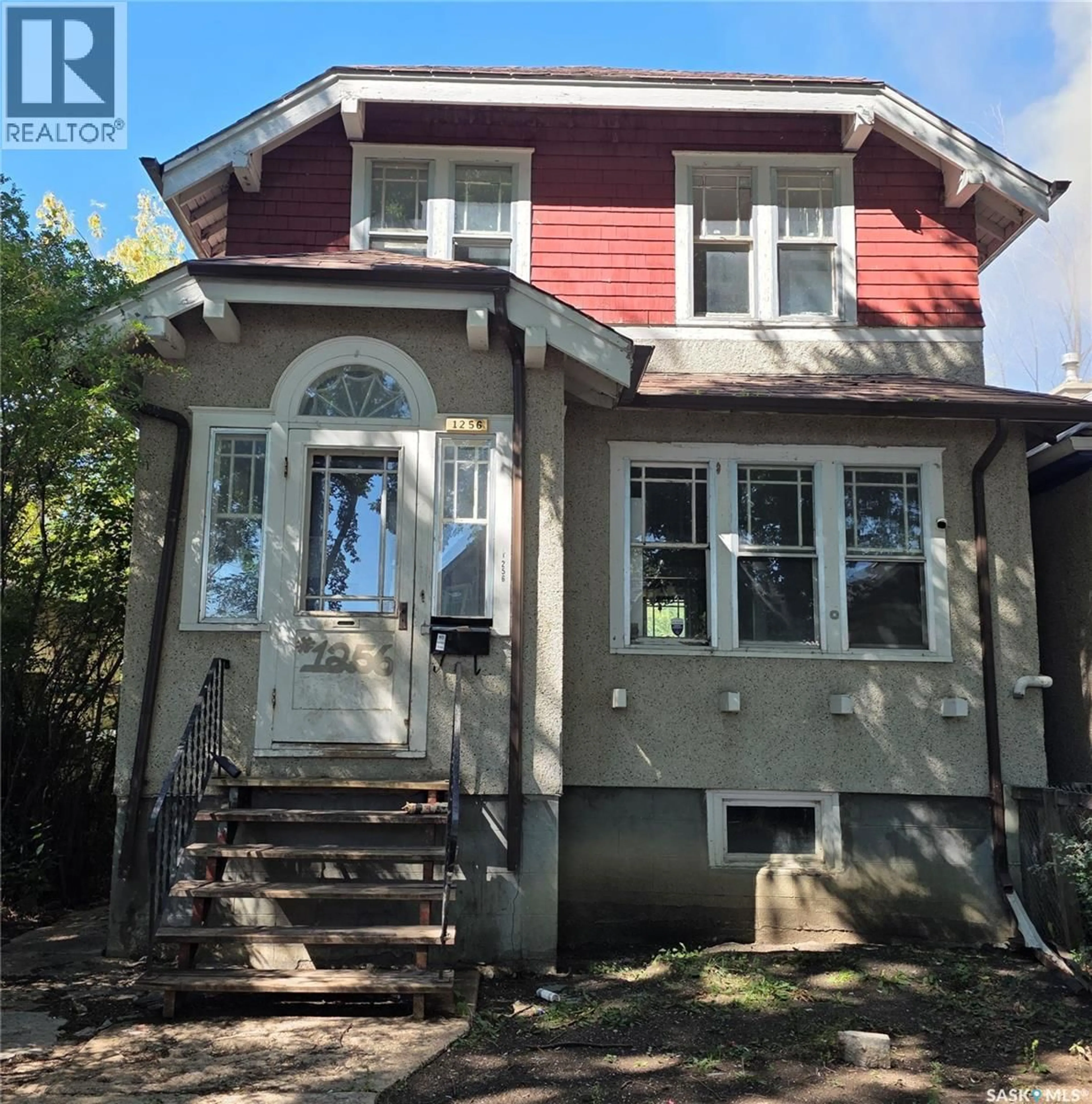 Home with vinyl exterior material, street for 1256 RAE STREET, Regina Saskatchewan S4T2C1