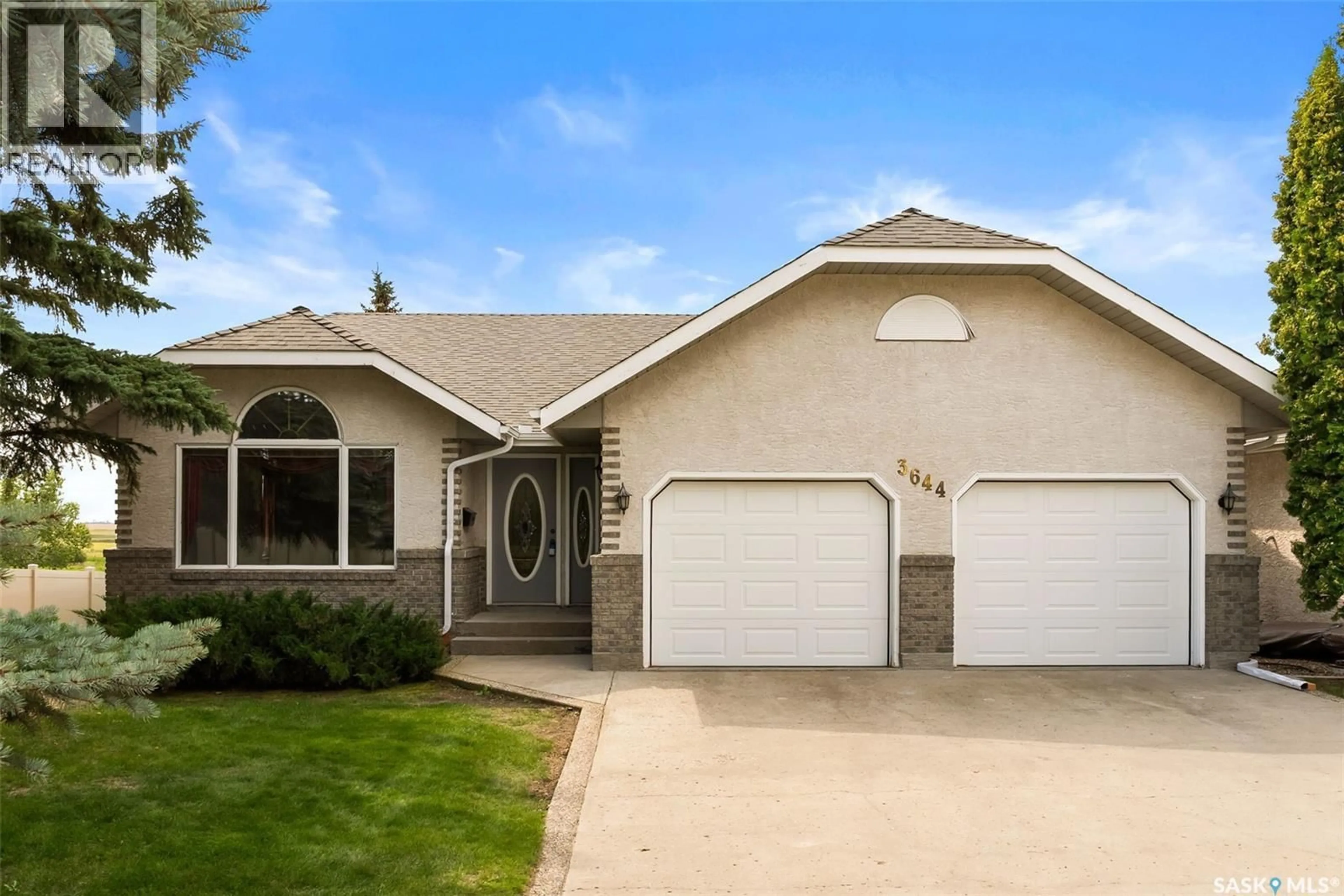 Home with vinyl exterior material, street for 3644 WEDGWOOD WAY, Regina Saskatchewan S4V2M4