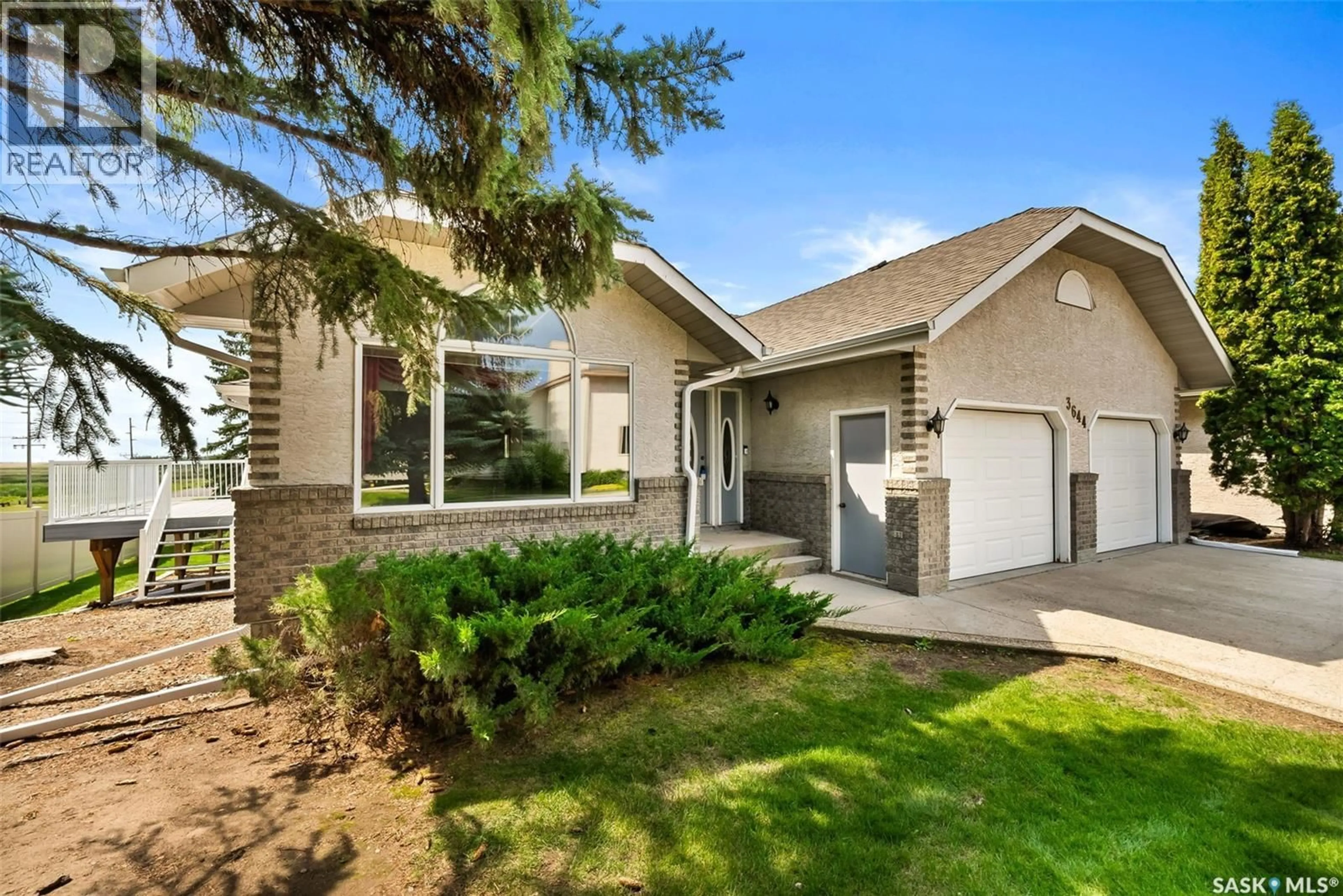 Home with vinyl exterior material, street for 3644 WEDGWOOD WAY, Regina Saskatchewan S4V2M4