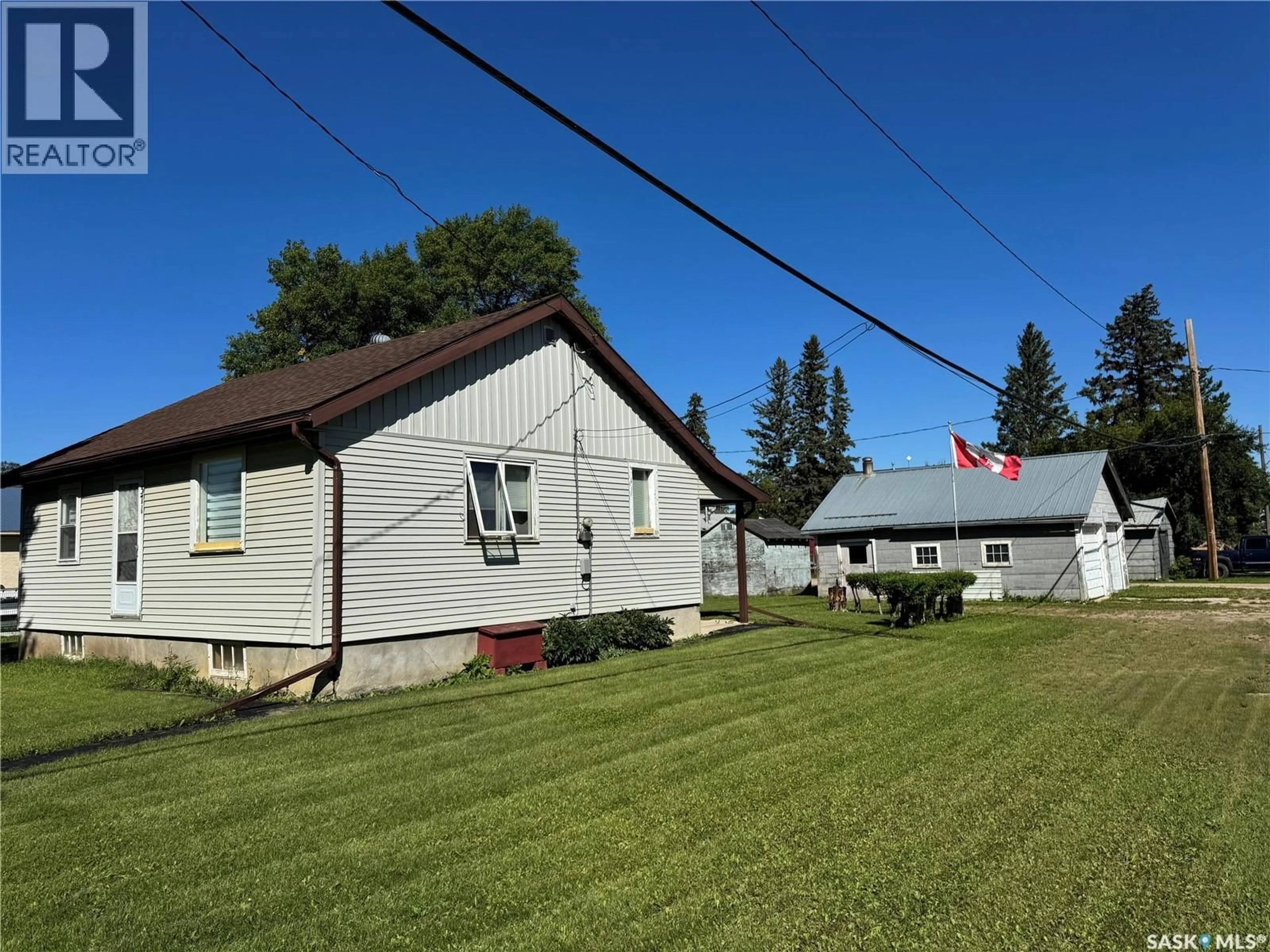 A pic from outside/outdoor area/front of a property/back of a property/a pic from drone, street for 371 STEVENS AVENUE, Birch Hills Saskatchewan S0J0G0
