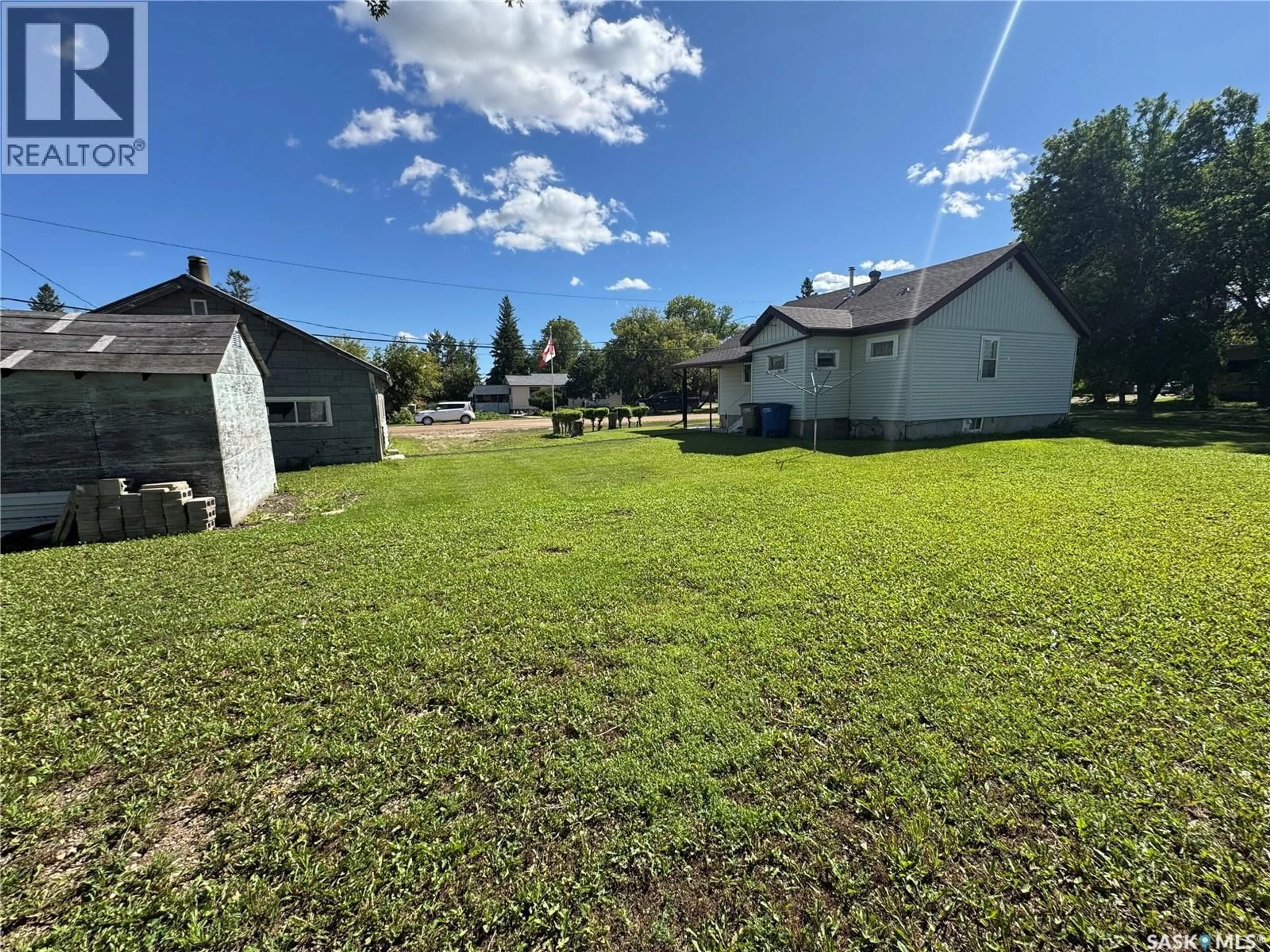 A pic from outside/outdoor area/front of a property/back of a property/a pic from drone, street for 371 STEVENS AVENUE, Birch Hills Saskatchewan S0J0G0