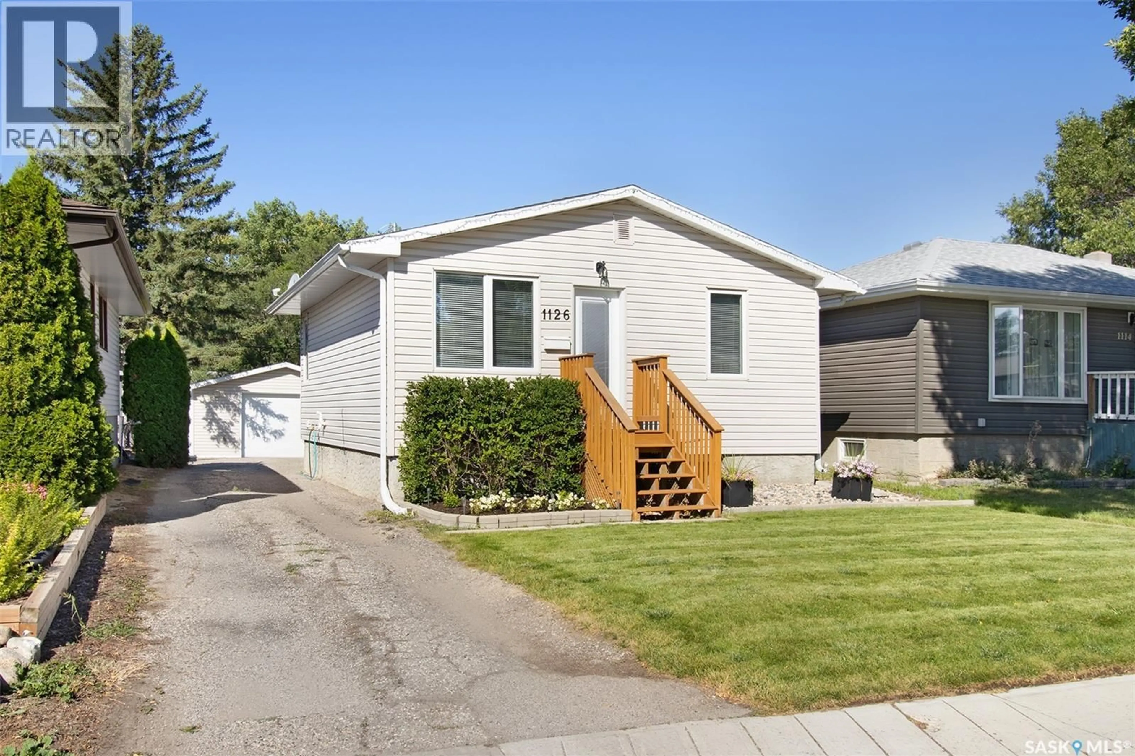 Home with vinyl exterior material, street for 1126 CAMPBELL STREET, Regina Saskatchewan S4T5P6