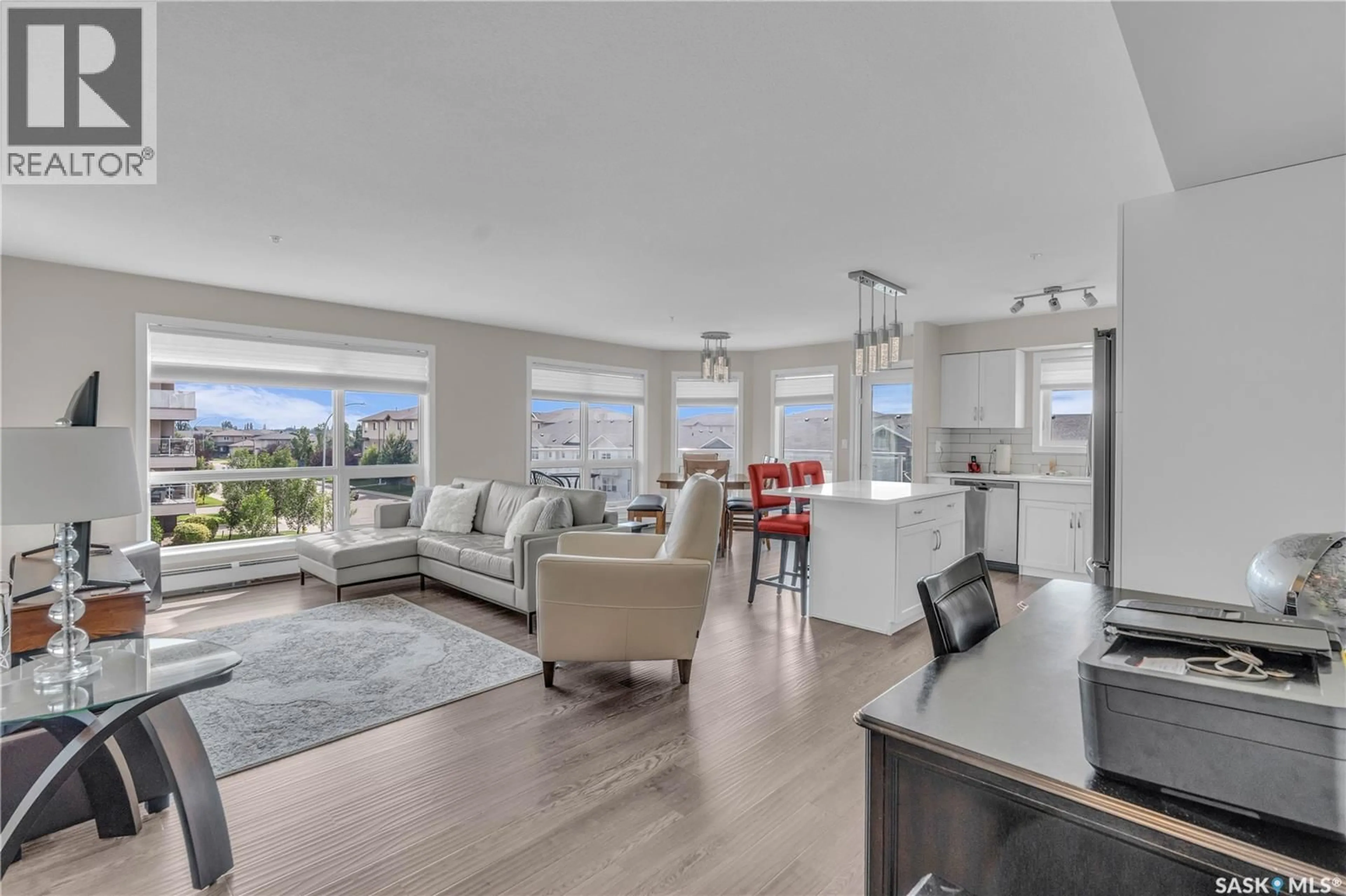 Living room with furniture, unknown for 204 - 2331 WINDSOR PARK ROAD, Regina Saskatchewan S4V3N3