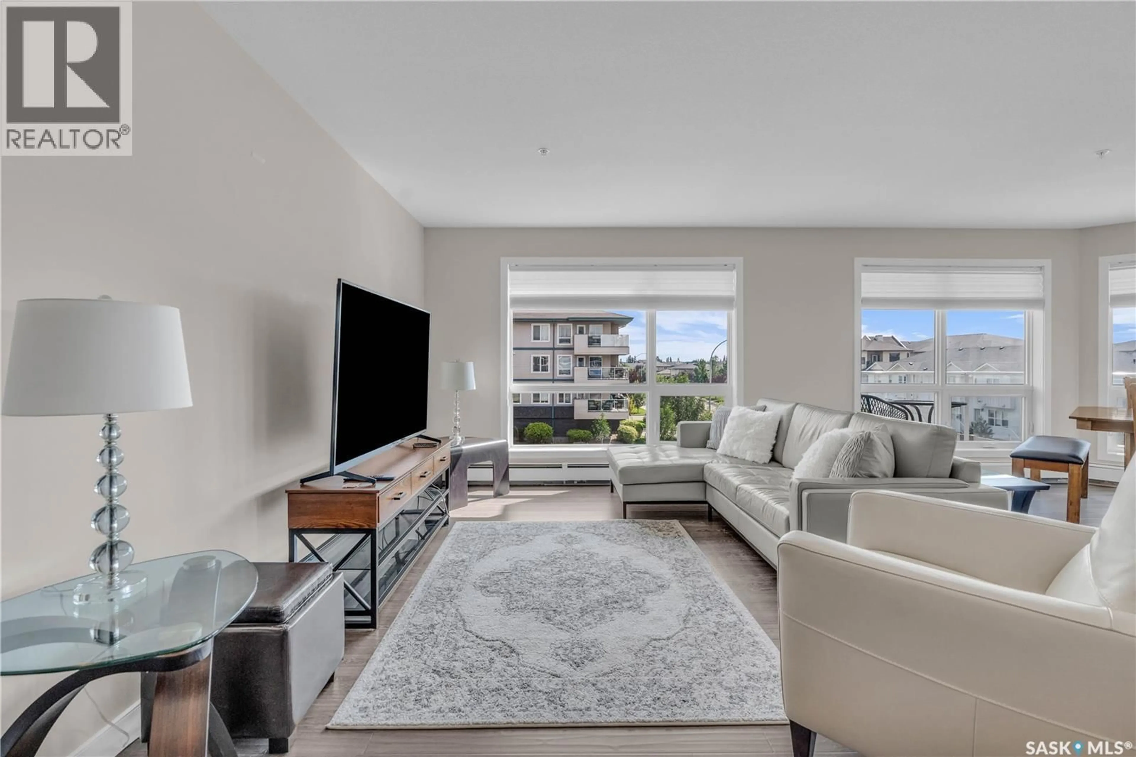 Living room with furniture, unknown for 204 - 2331 WINDSOR PARK ROAD, Regina Saskatchewan S4V3N3