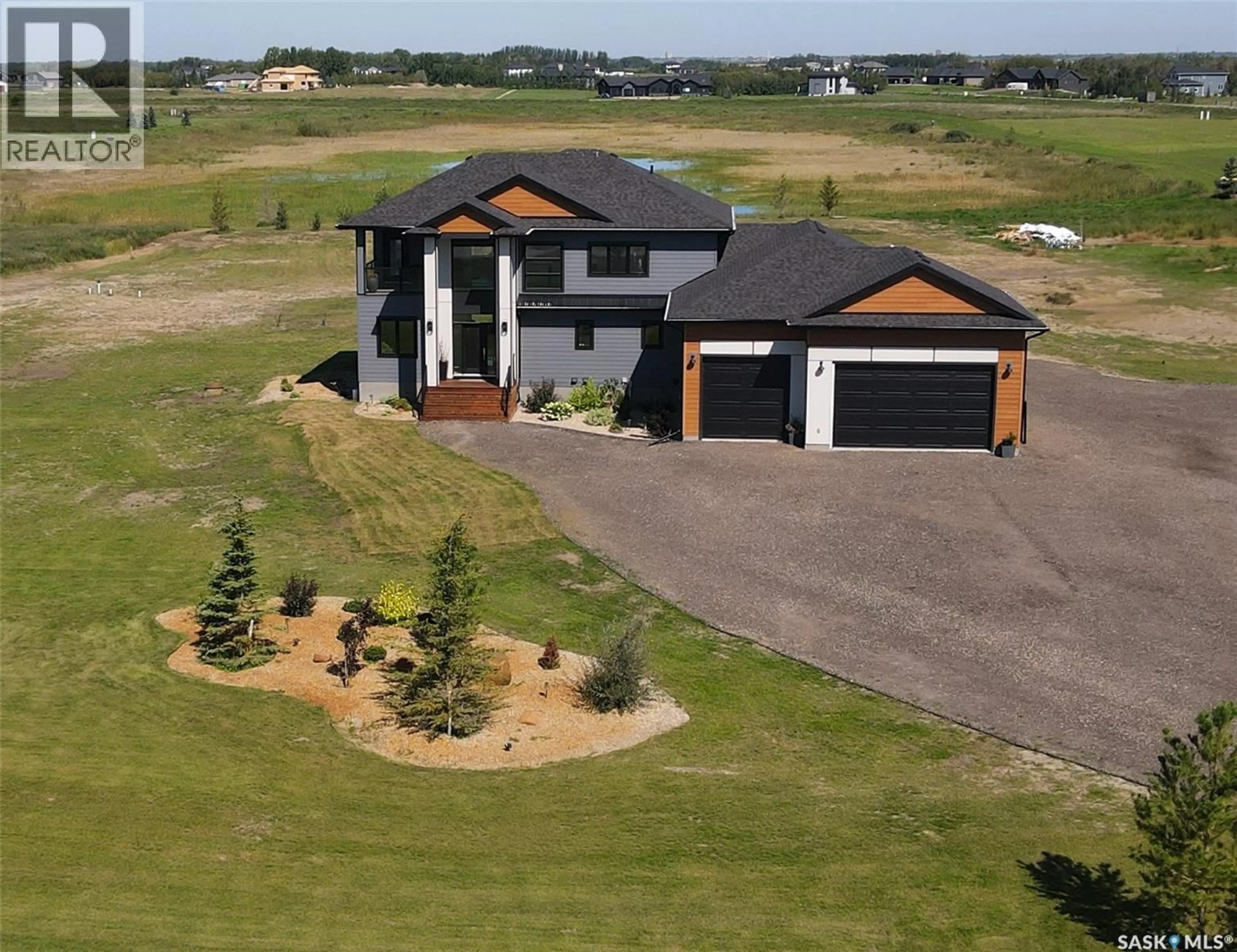 A pic from outside/outdoor area/front of a property/back of a property/a pic from drone, unknown for 172 GRANDVIEW TRAIL, Corman Park Rm No. 344 Saskatchewan S7T0W5