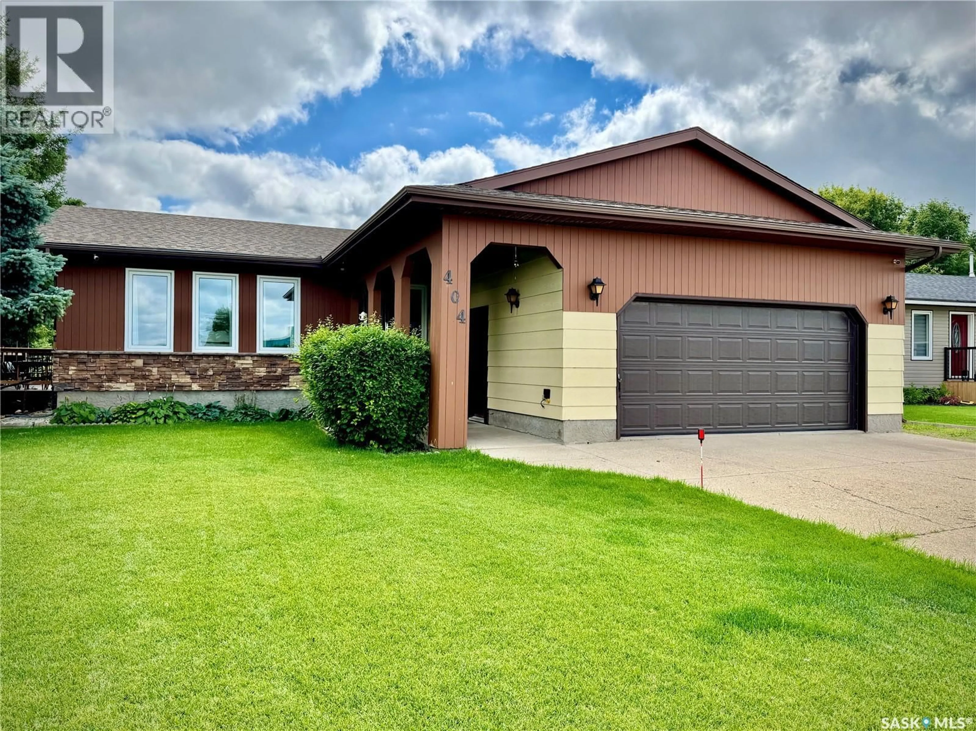 Home with brick exterior material, street for 404 DARLINGTON STREET, Yorkton Saskatchewan S3N3Y9
