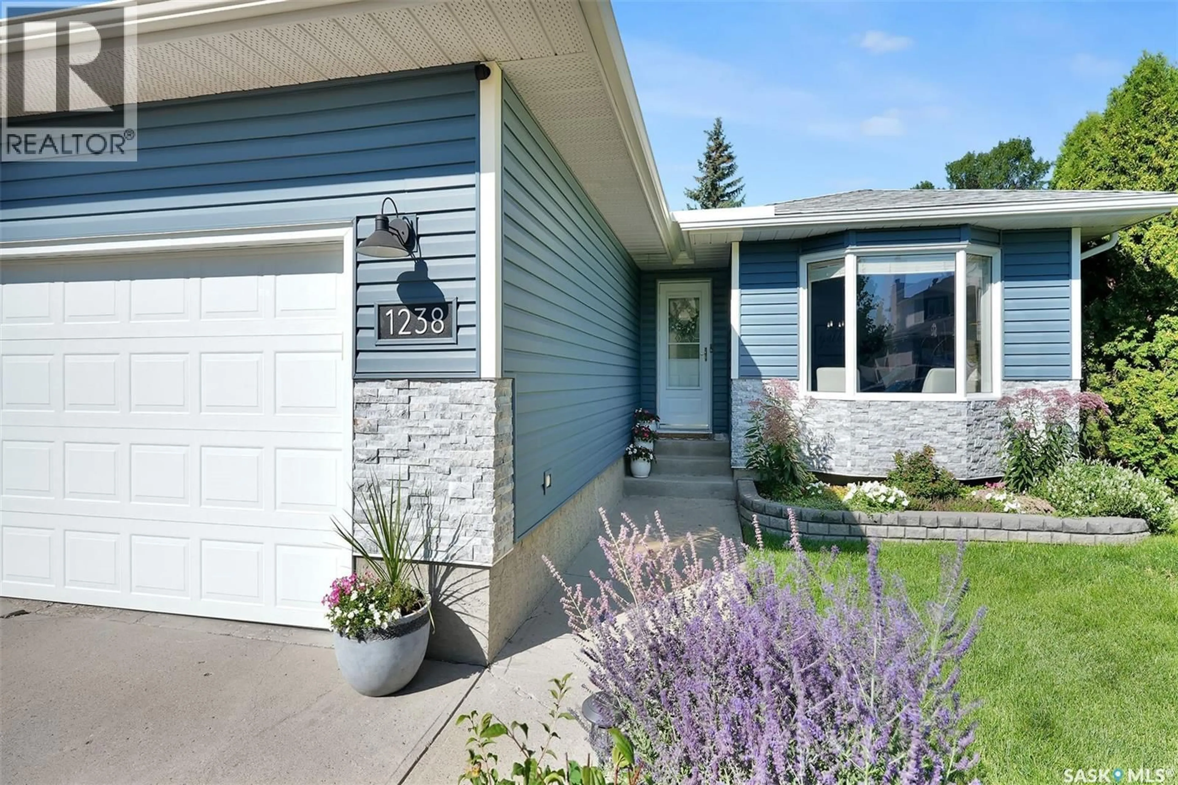 Home with vinyl exterior material, street for 1238 GELSINGER PLACE, Regina Saskatchewan S4X4K2