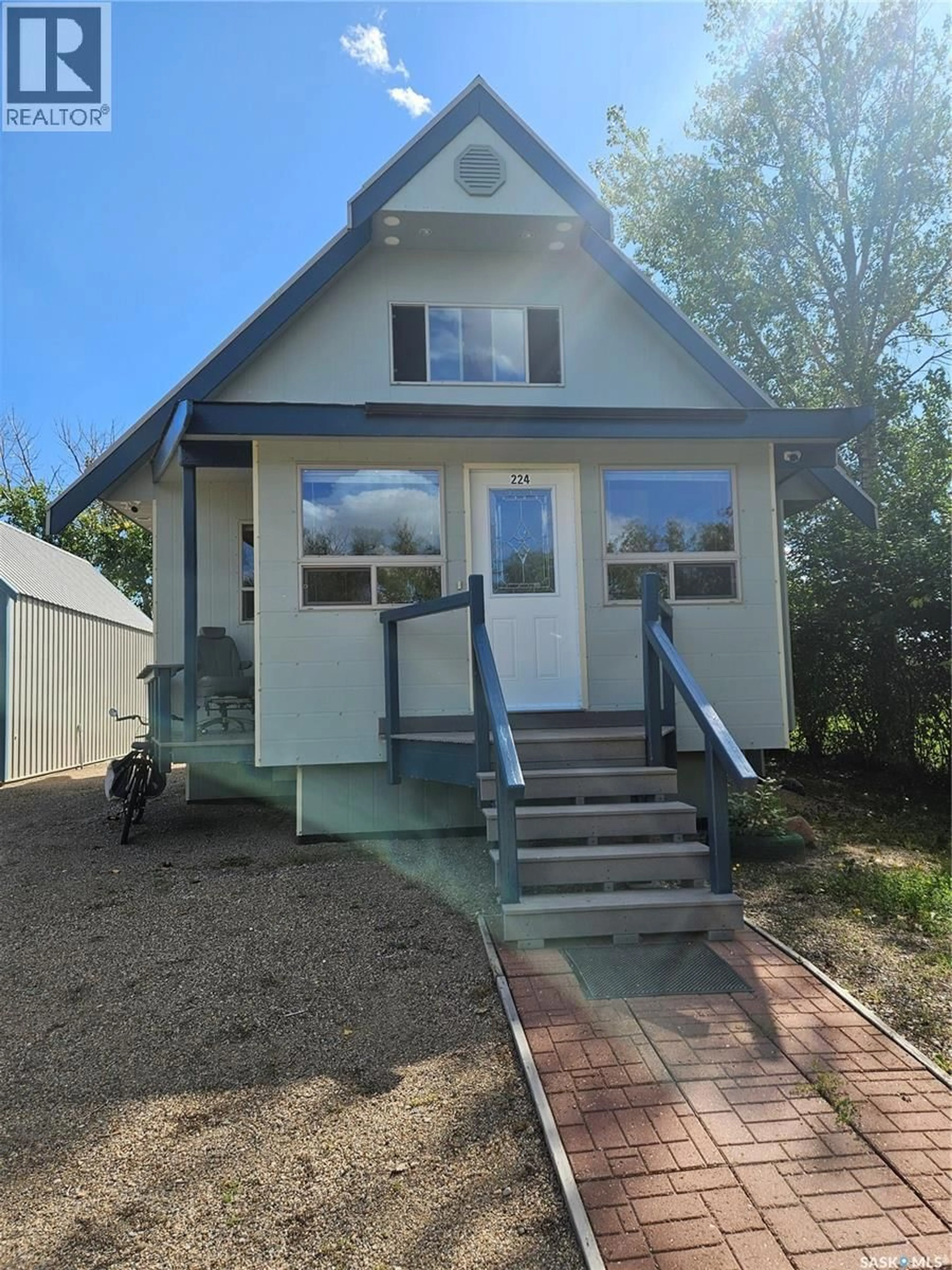 Home with vinyl exterior material, street for 224 BIRD STREET, Loreburn Saskatchewan S0H2S0
