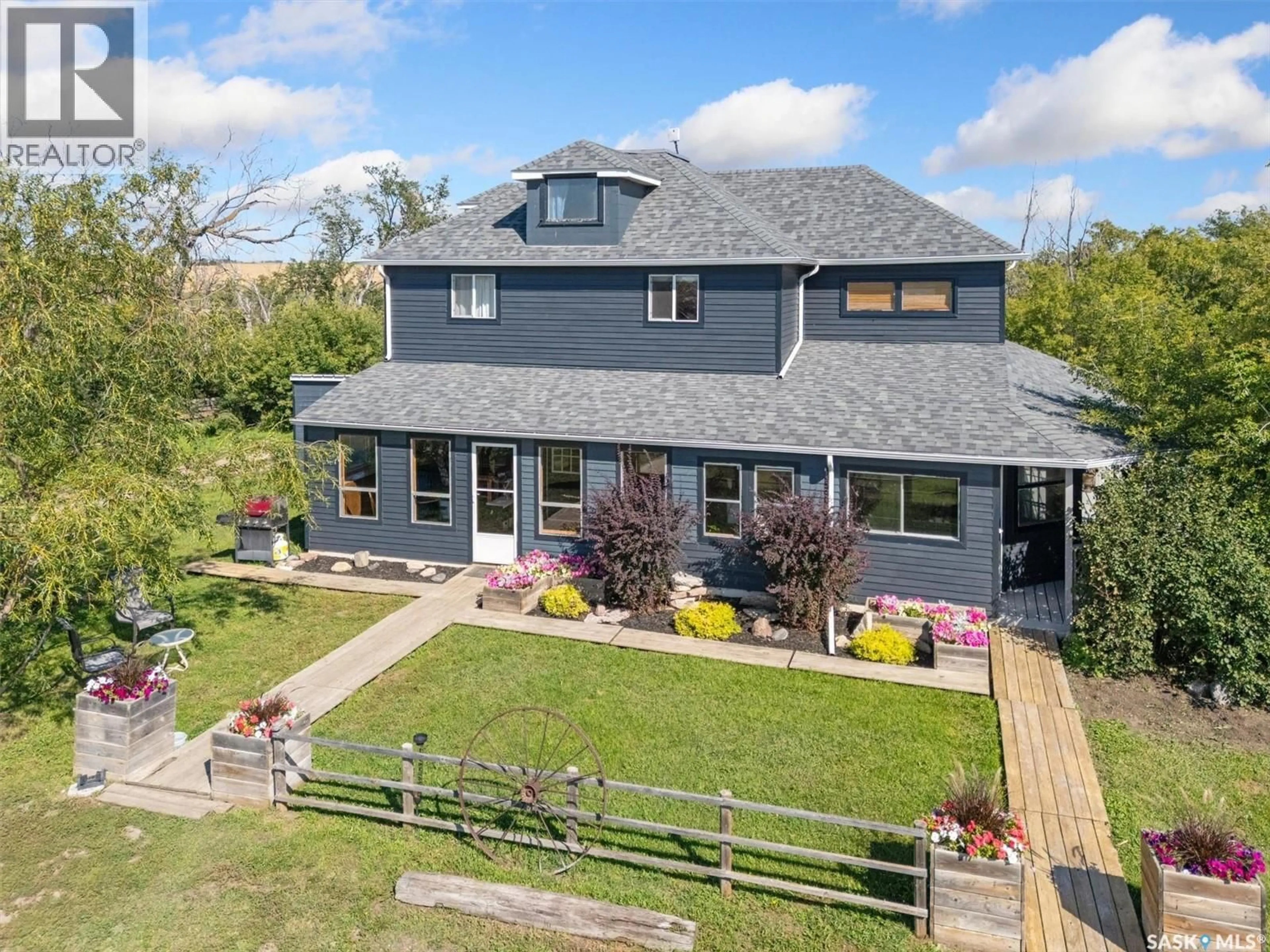 A pic from outside/outdoor area/front of a property/back of a property/a pic from drone, building for WALDNER ACREAGE, Aberdeen Rm No. 373 Saskatchewan S0A0A8