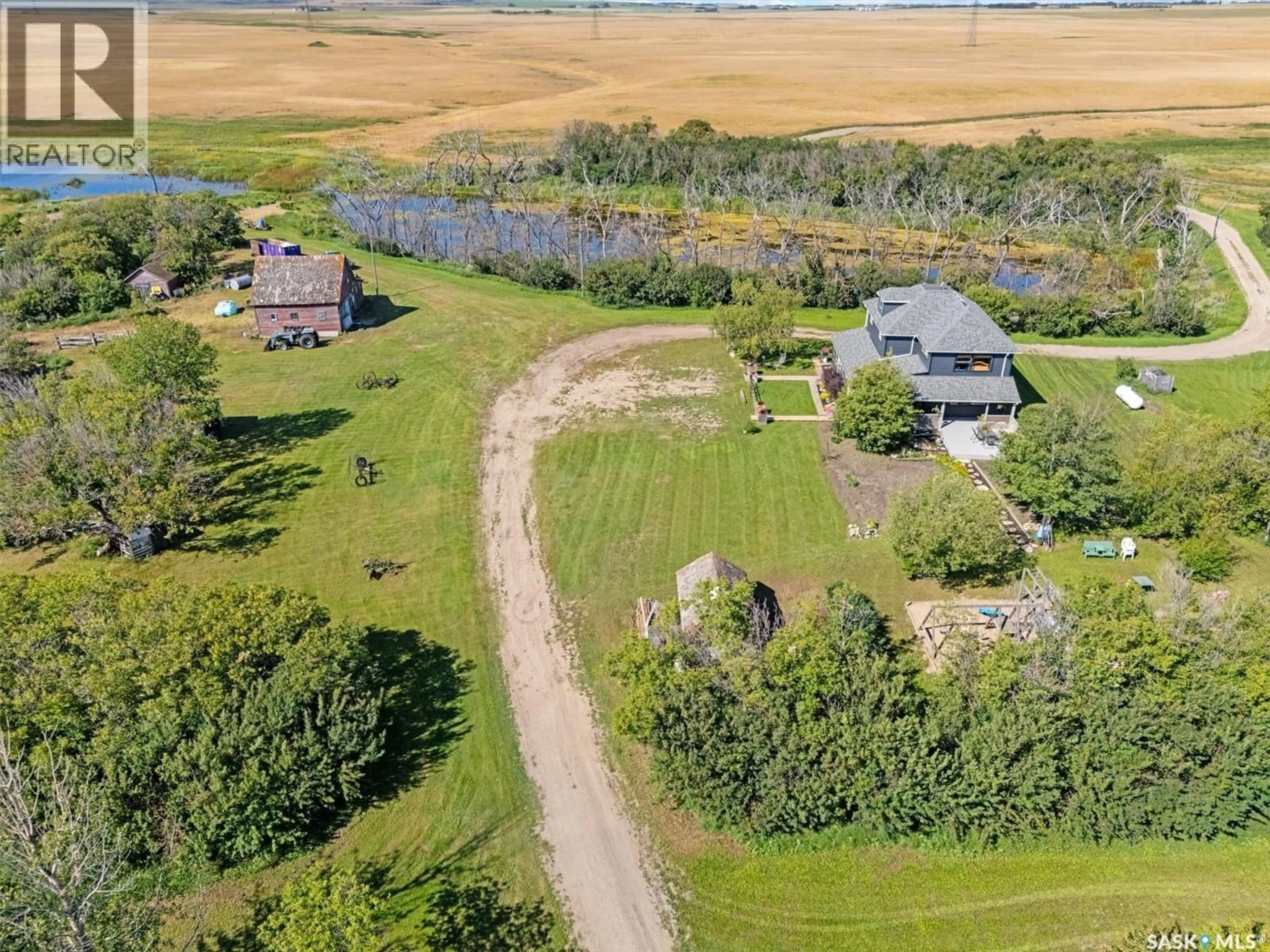 A pic from outside/outdoor area/front of a property/back of a property/a pic from drone, water/lake/river/ocean view for WALDNER ACREAGE, Aberdeen Rm No. 373 Saskatchewan S0A0A8