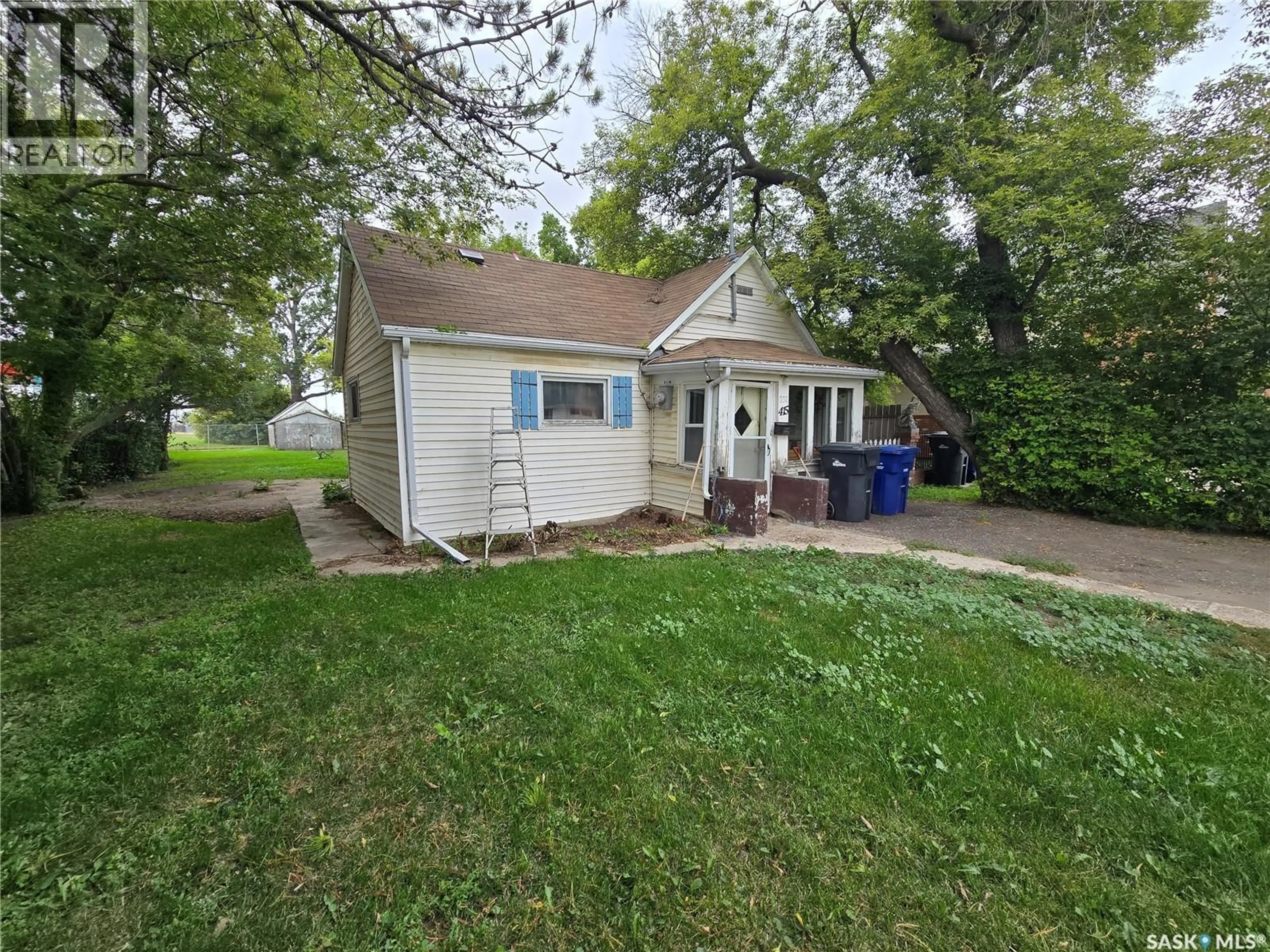 A pic from outside/outdoor area/front of a property/back of a property/a pic from drone, street for 415 GOVERNMENT ROAD, Weyburn Saskatchewan S4H0P5
