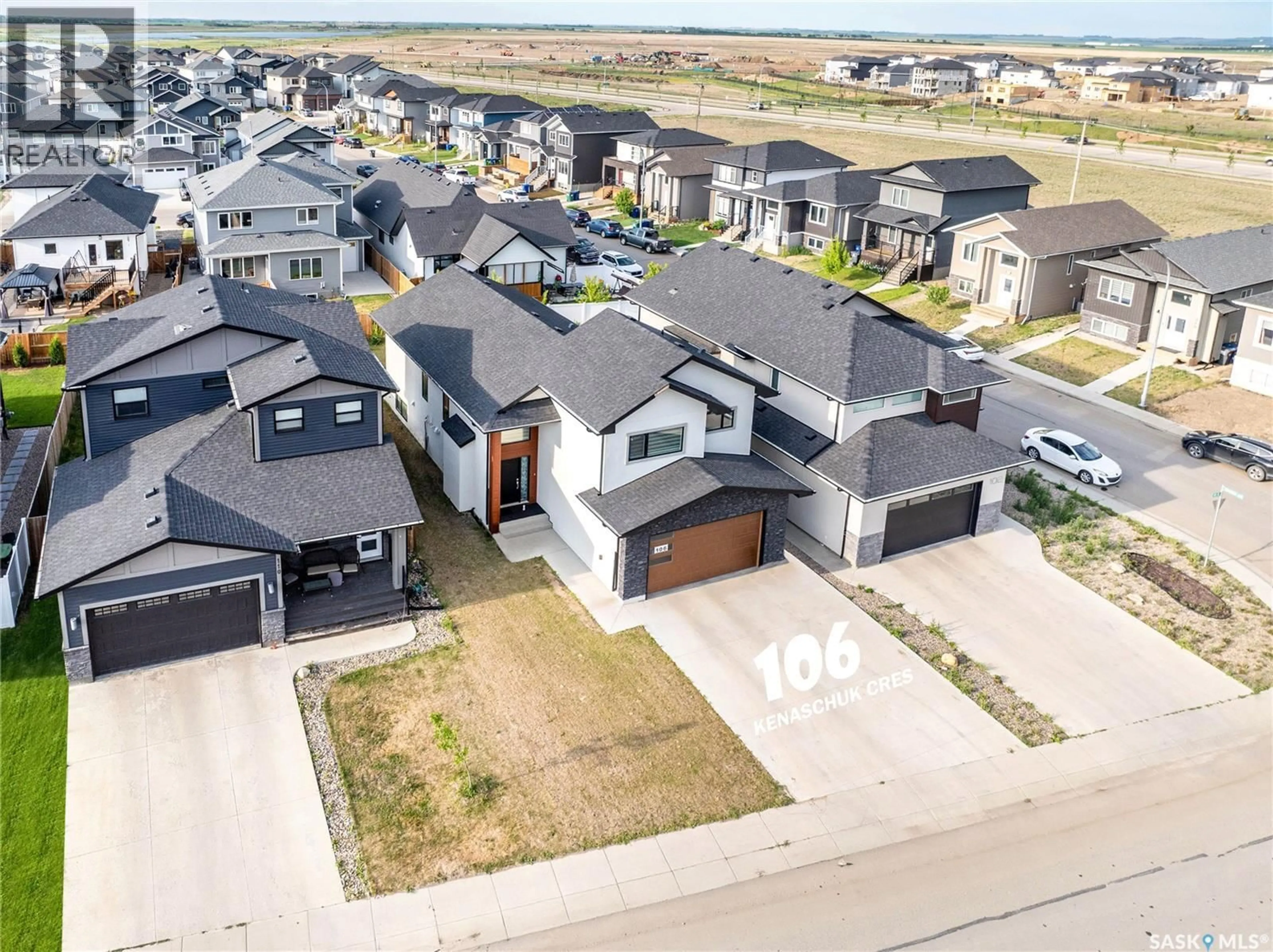 A pic from outside/outdoor area/front of a property/back of a property/a pic from drone, street for 106 KENASCHUK CRESCENT, Saskatoon Saskatchewan S7W0Y6