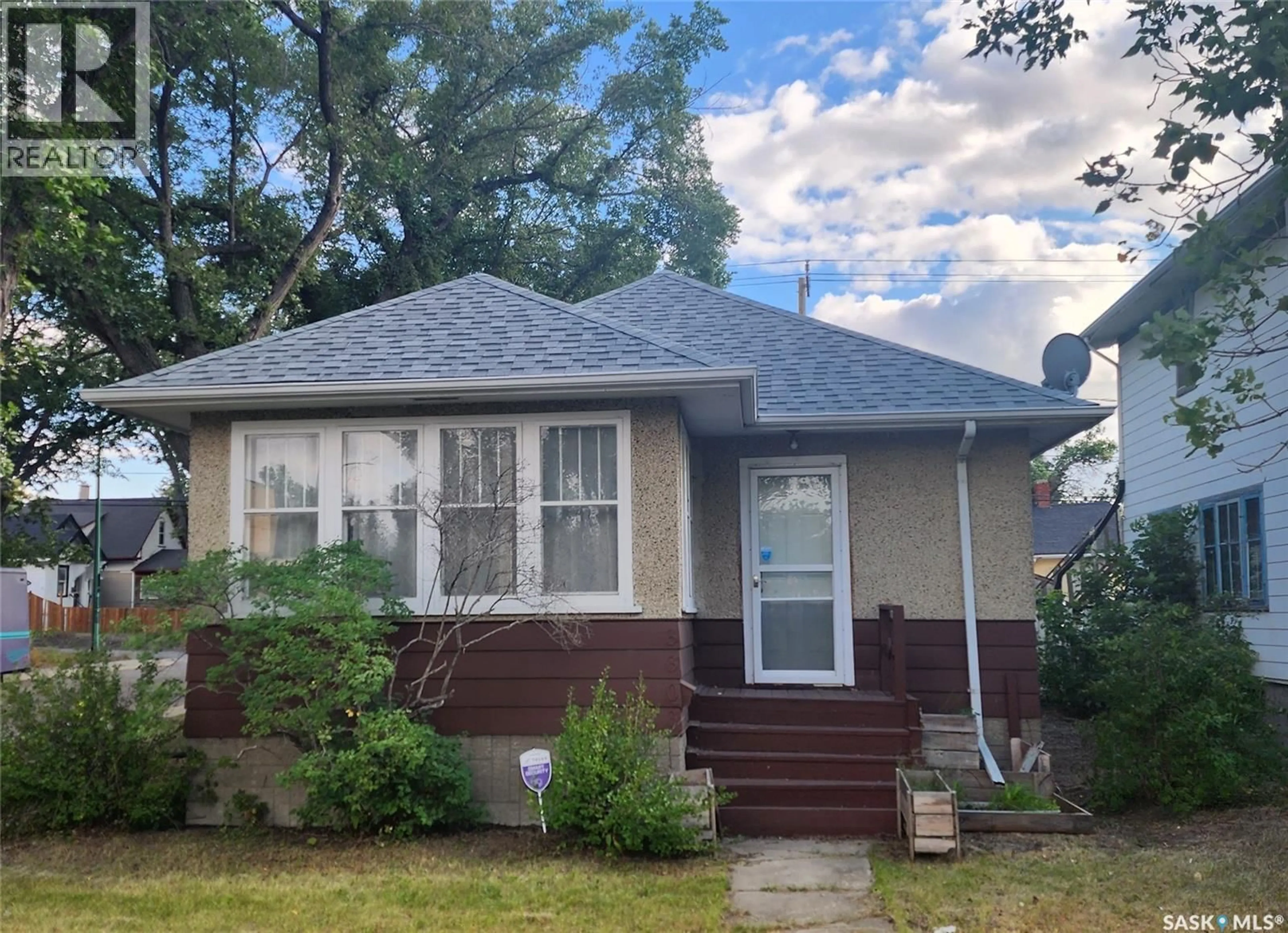 Home with vinyl exterior material, street for 3303 DEWDNEY AVENUE, Regina Saskatchewan S4T0Y9