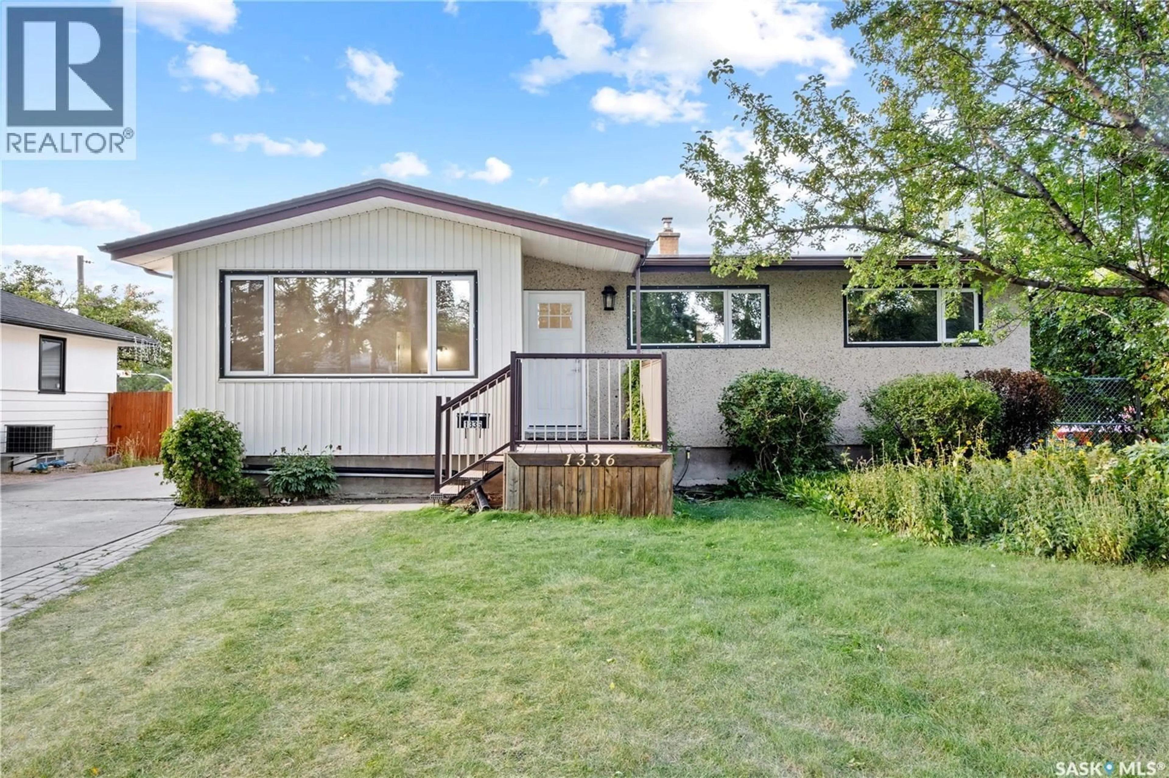 Home with vinyl exterior material, street for 1336 MCNIVEN AVENUE, Regina Saskatchewan S4S3X8