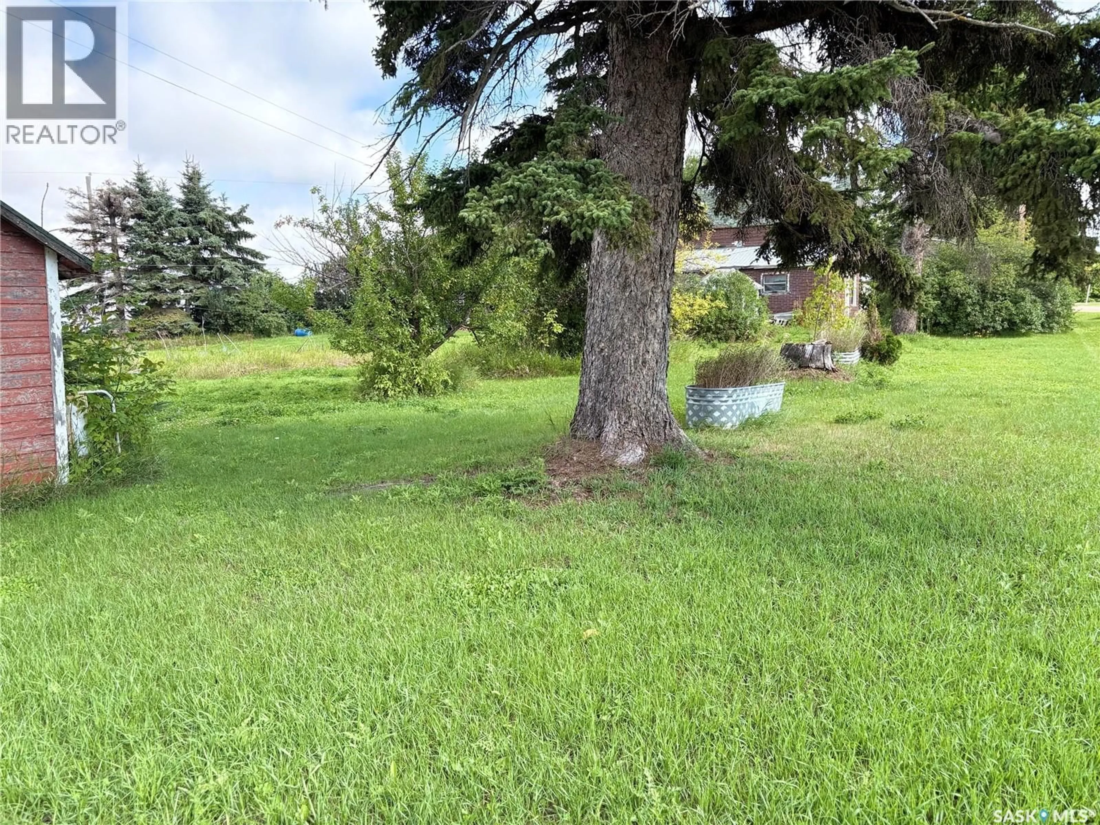 A pic from outside/outdoor area/front of a property/back of a property/a pic from drone, forest/trees view for 190 WEST STREET, Togo Saskatchewan S0A4E0