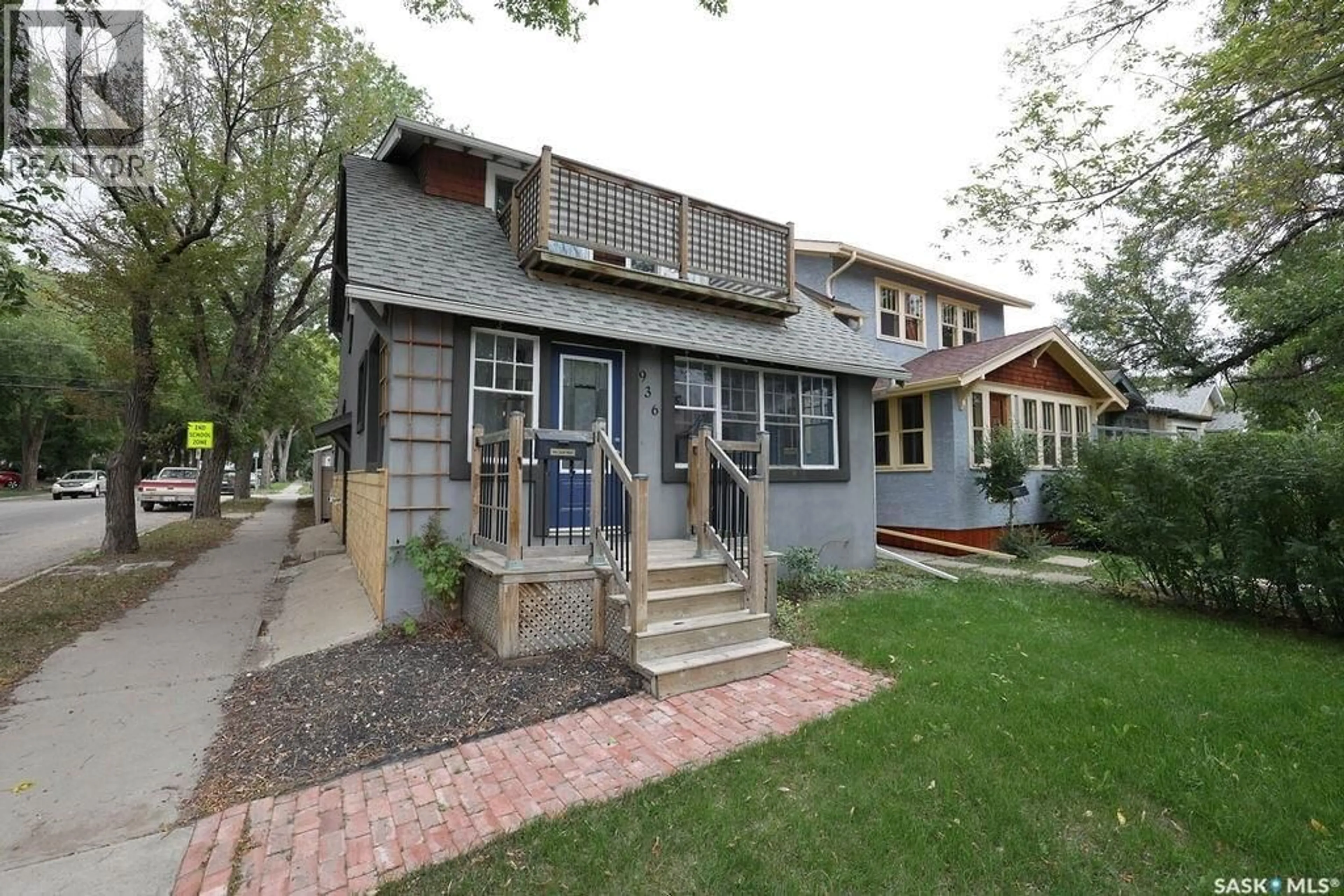 Home with brick exterior material, street for 936 COLLEGE AVENUE, Regina Saskatchewan S4N0Y3