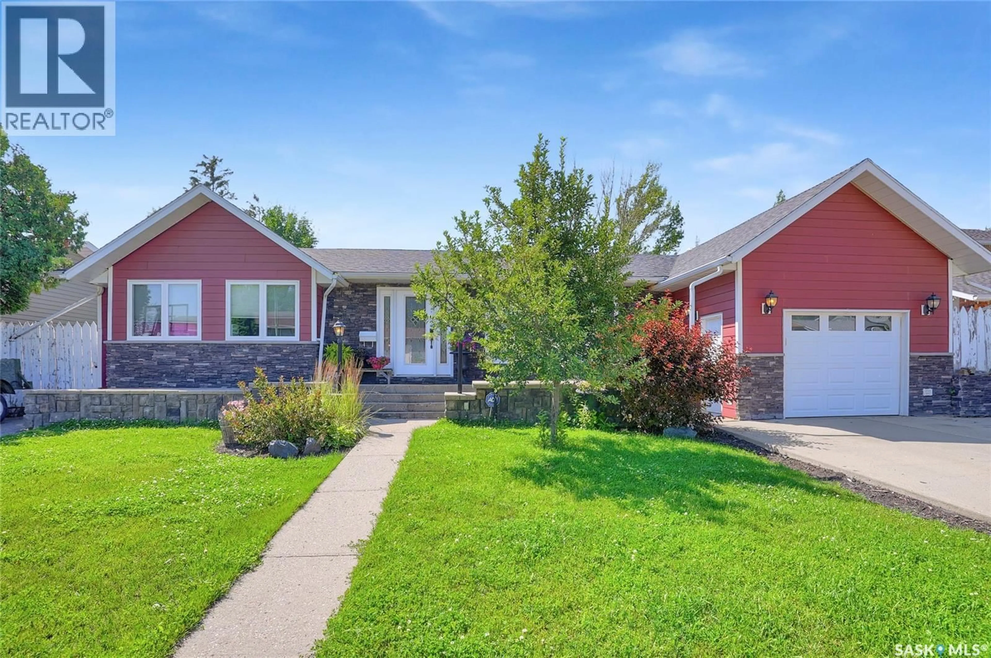 Home with vinyl exterior material, street for 1614 11TH AVENUE, Moose Jaw Saskatchewan S6H6W9