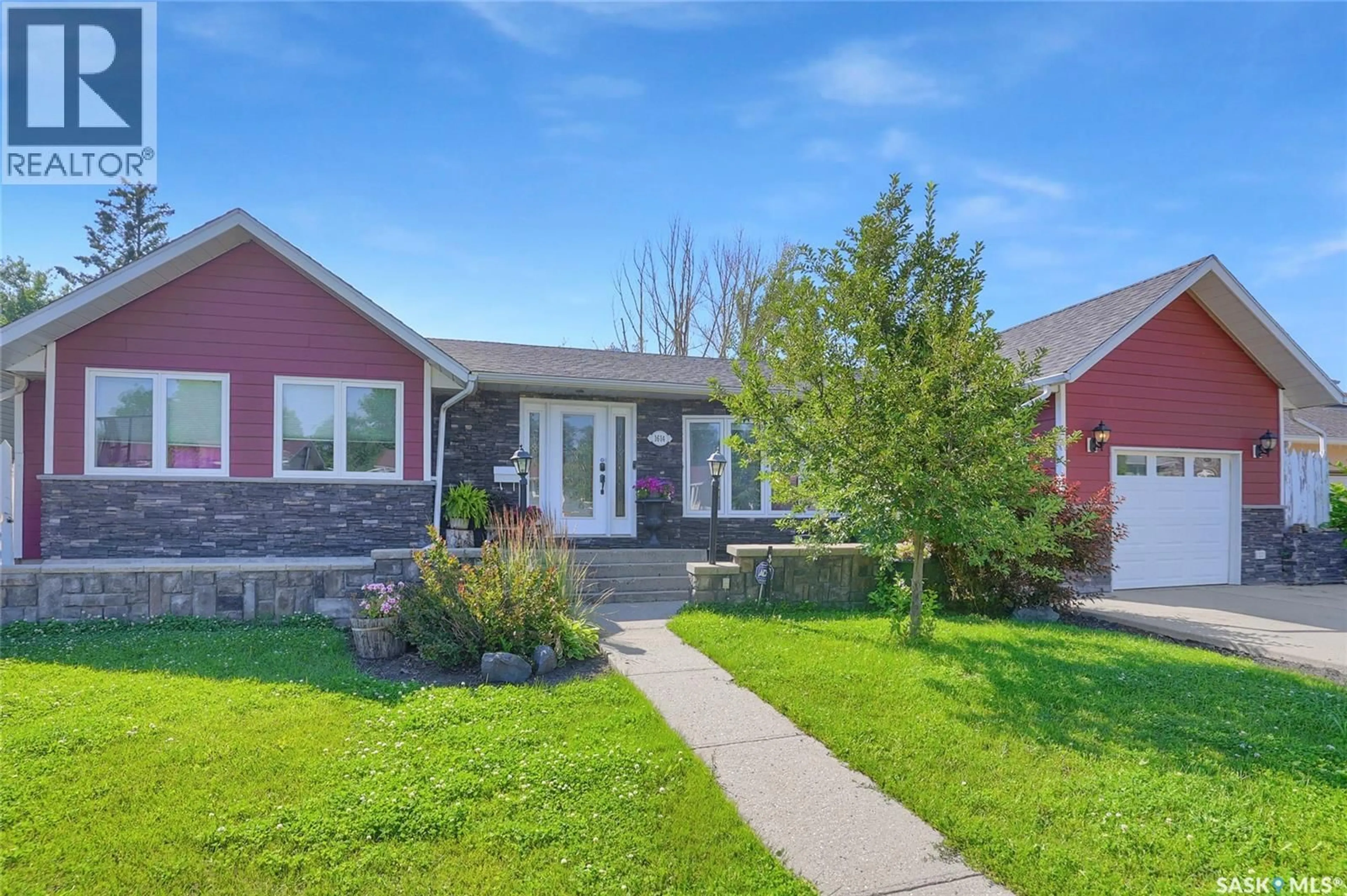 Home with vinyl exterior material, street for 1614 11TH AVENUE, Moose Jaw Saskatchewan S6H6W9