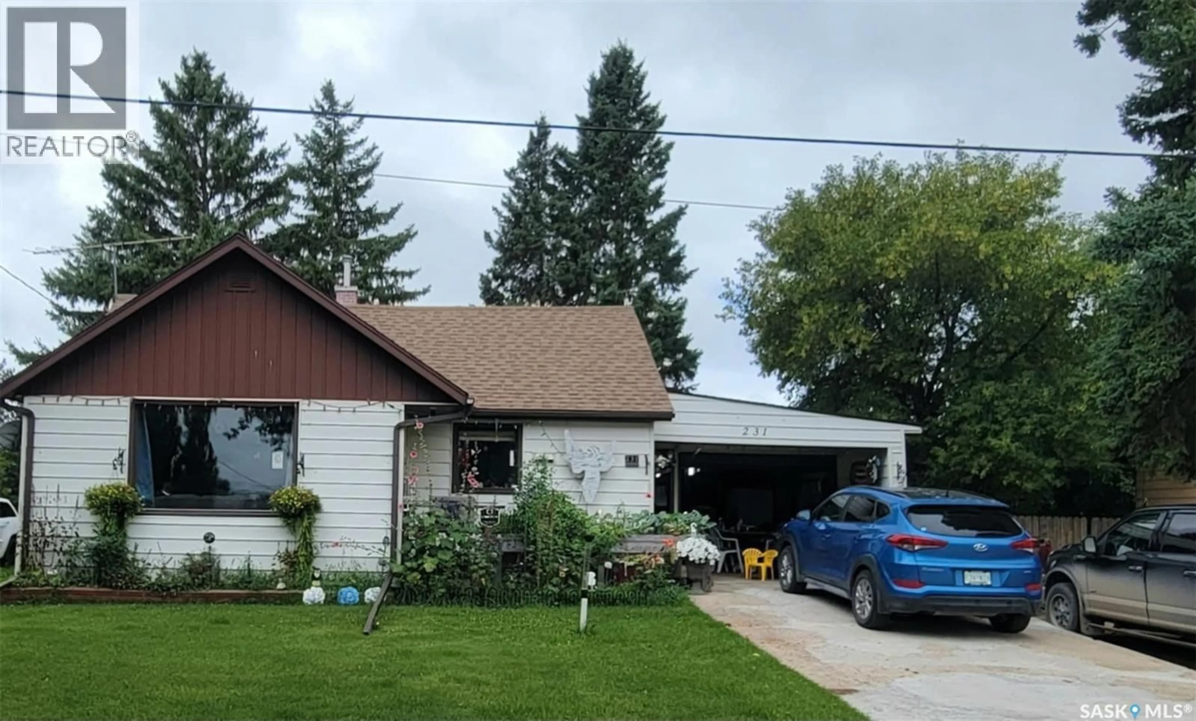 Home with vinyl exterior material, street for 231 THIRD STREET, Preeceville Saskatchewan S0A3B0