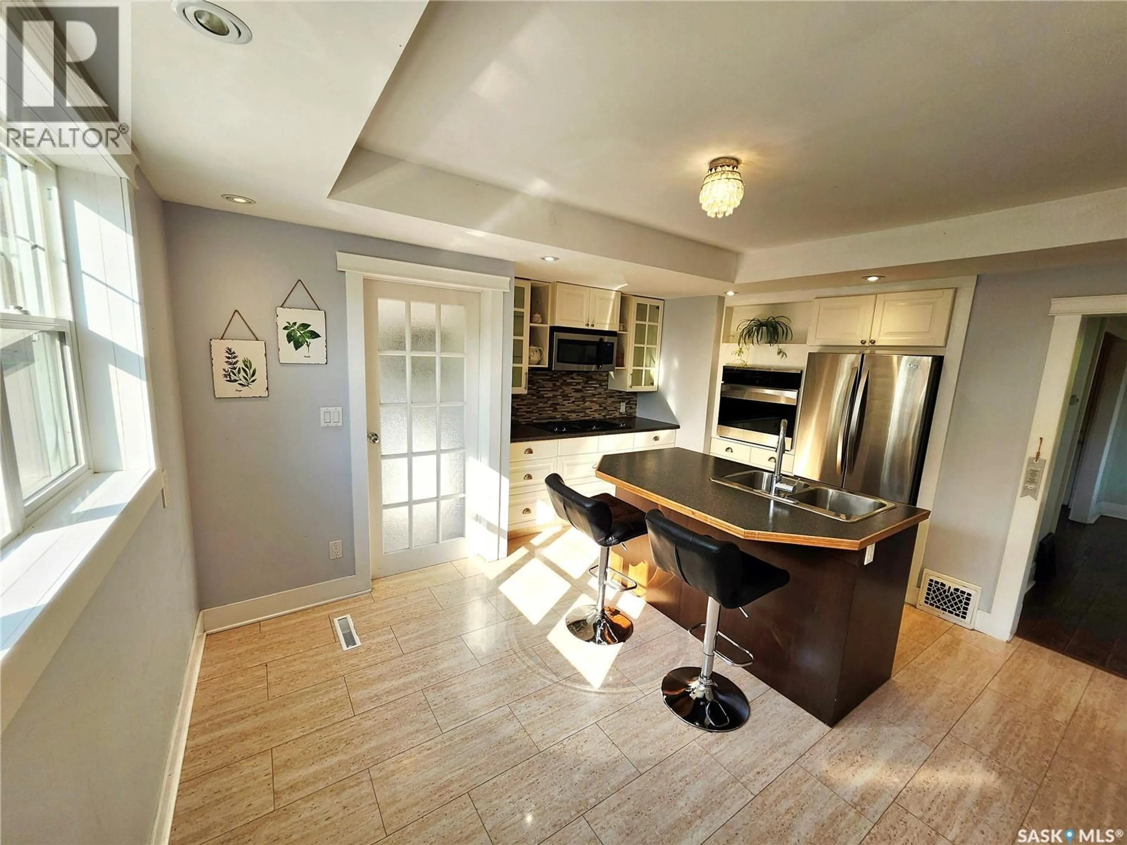 Open concept kitchen, ceramic/tile floor for 428 SUMNER STREET, Esterhazy Saskatchewan S0A0X0