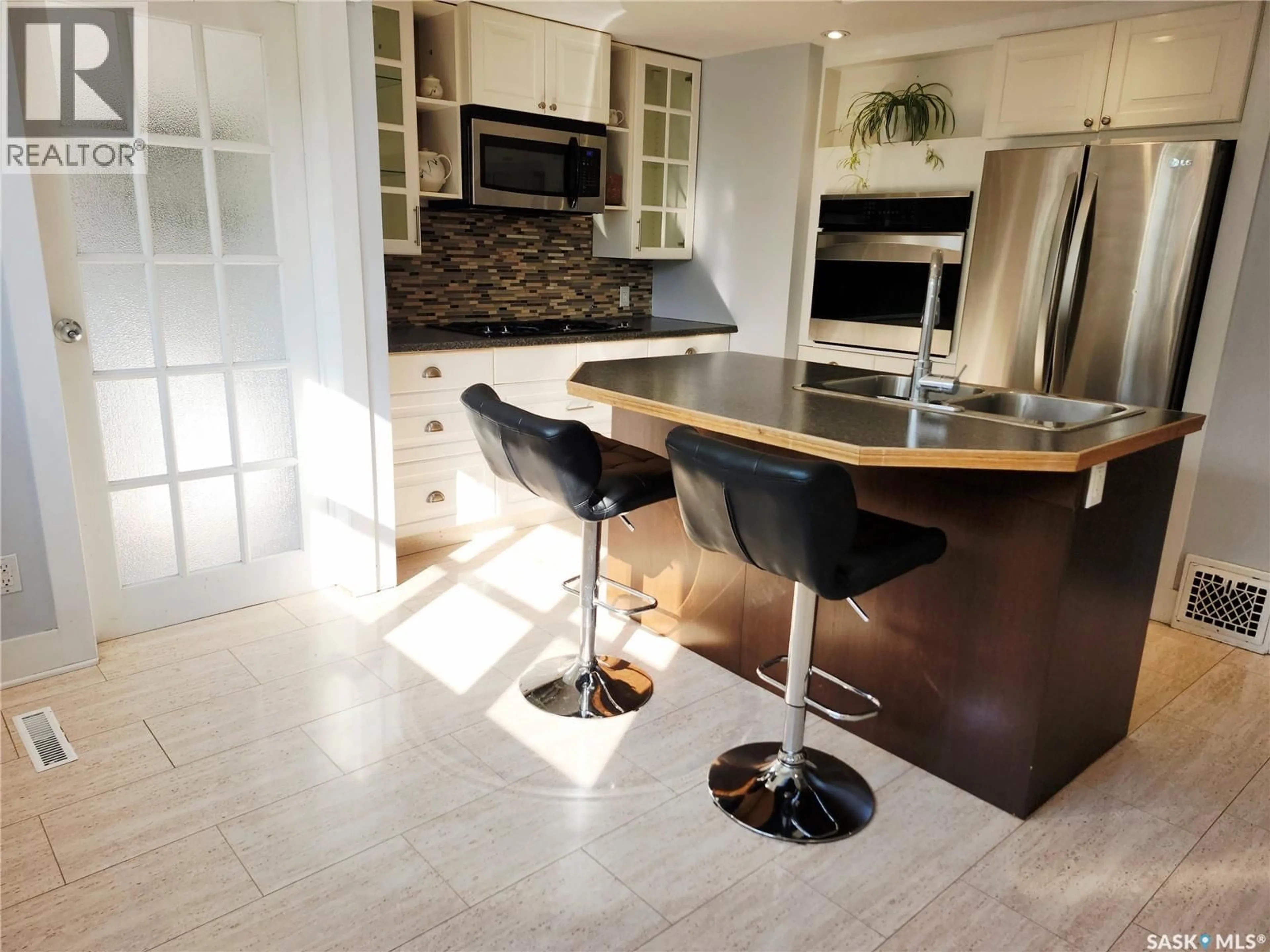 Contemporary kitchen, ceramic/tile floor for 428 SUMNER STREET, Esterhazy Saskatchewan S0A0X0