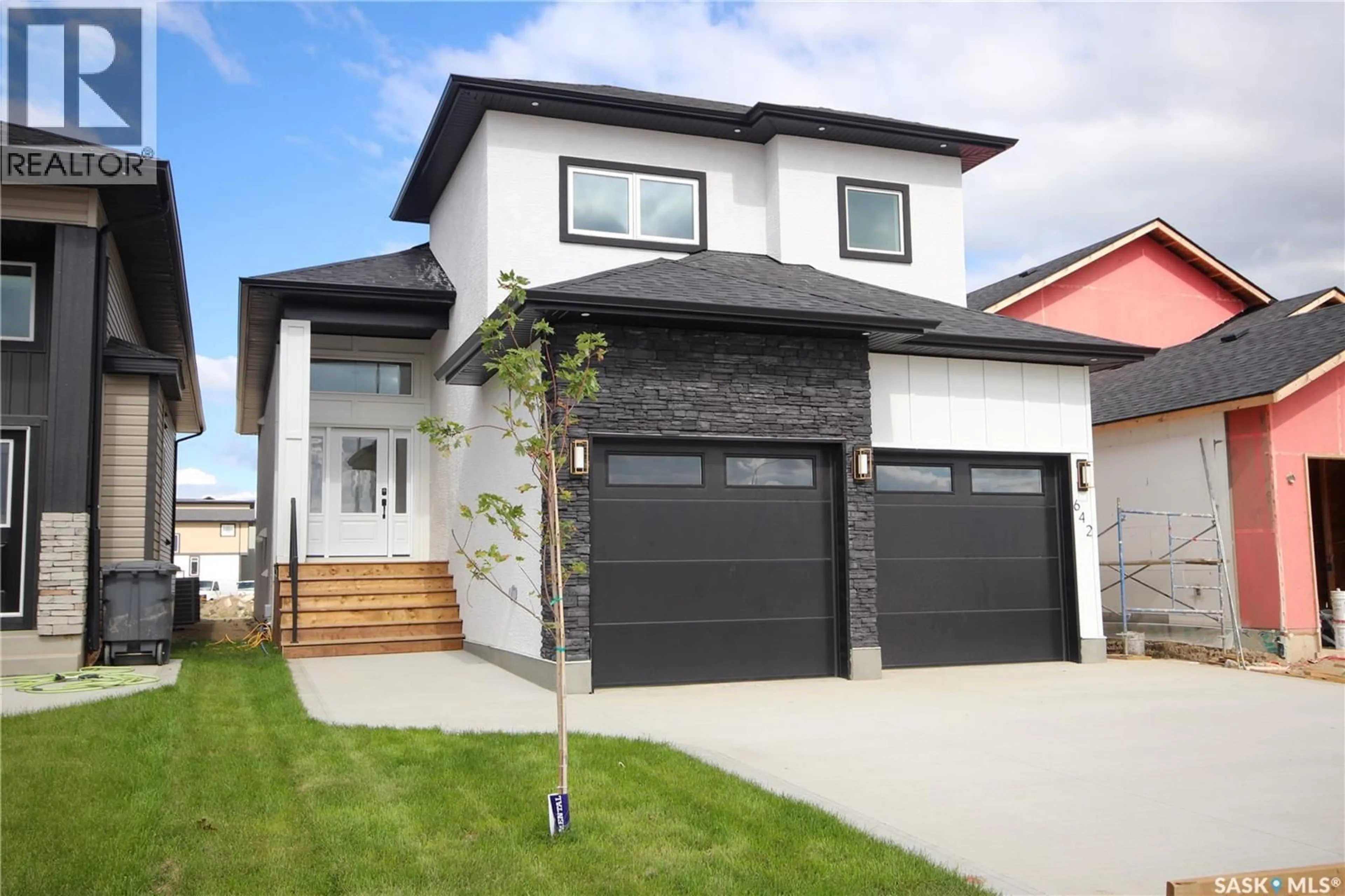 Home with vinyl exterior material, street for 642 SHARMA CRESCENT, Saskatoon Saskatchewan S7W1L2