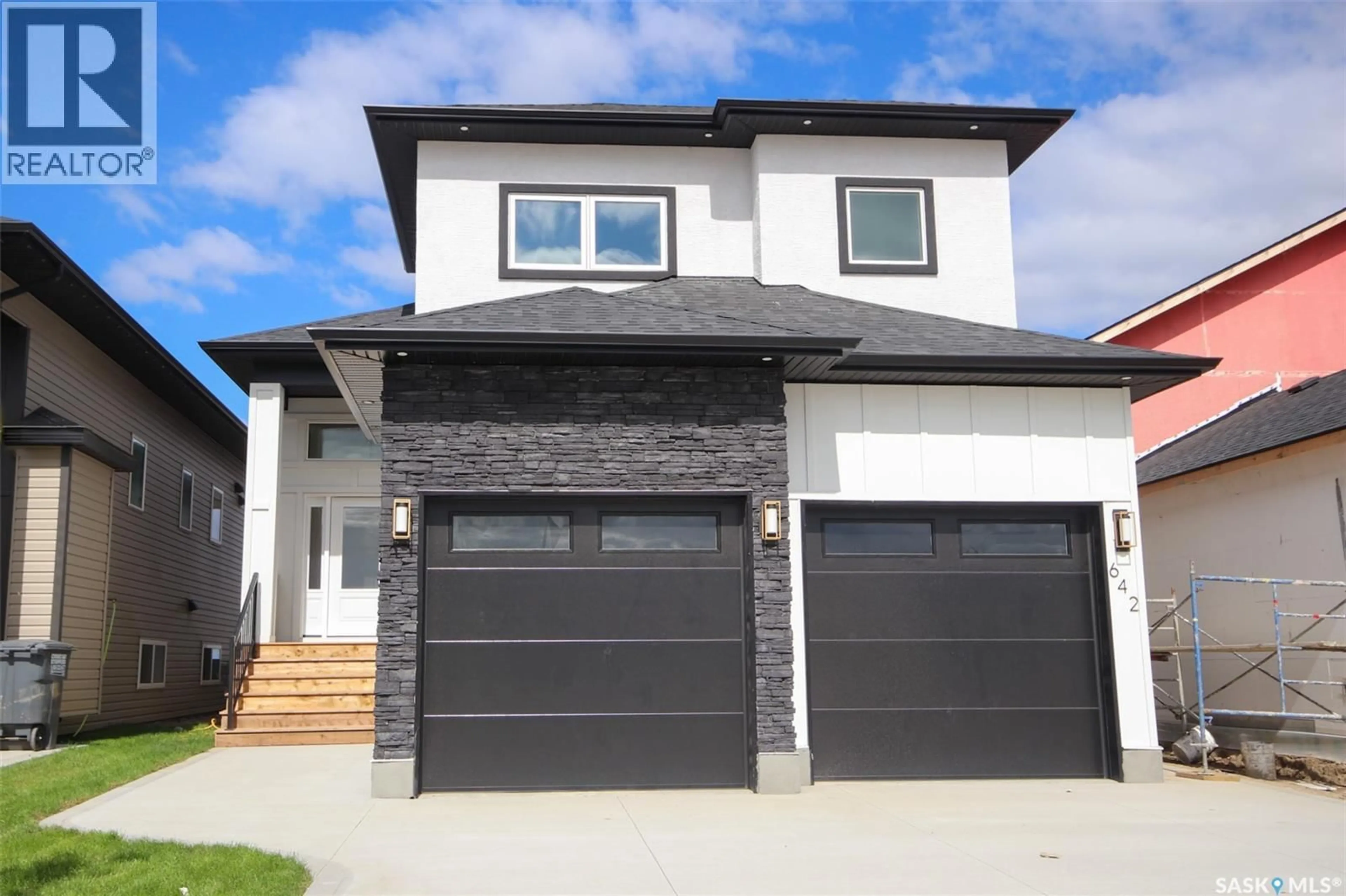 Home with vinyl exterior material, street for 642 SHARMA CRESCENT, Saskatoon Saskatchewan S7W1L2