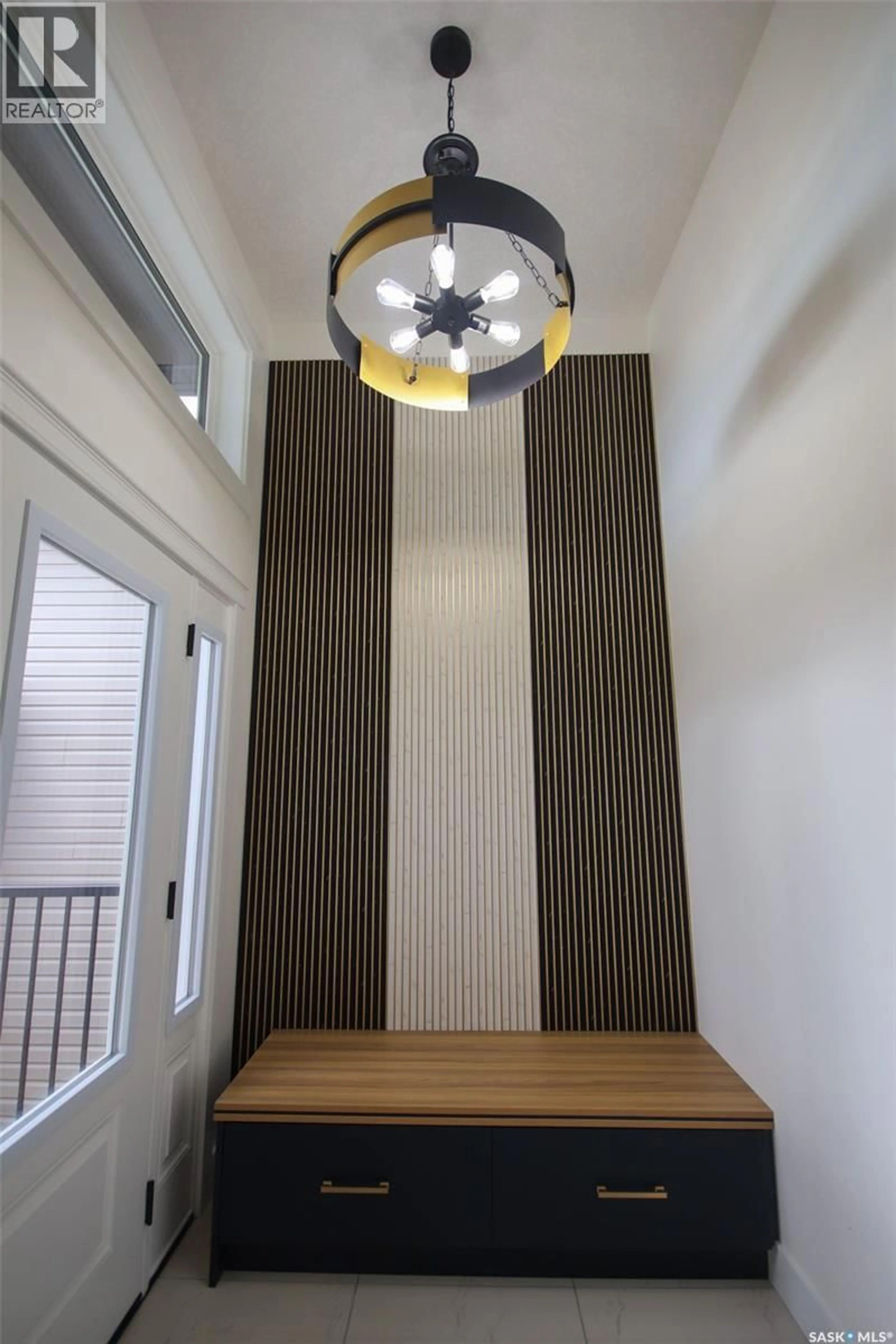 Indoor foyer for 642 SHARMA CRESCENT, Saskatoon Saskatchewan S7W1L2