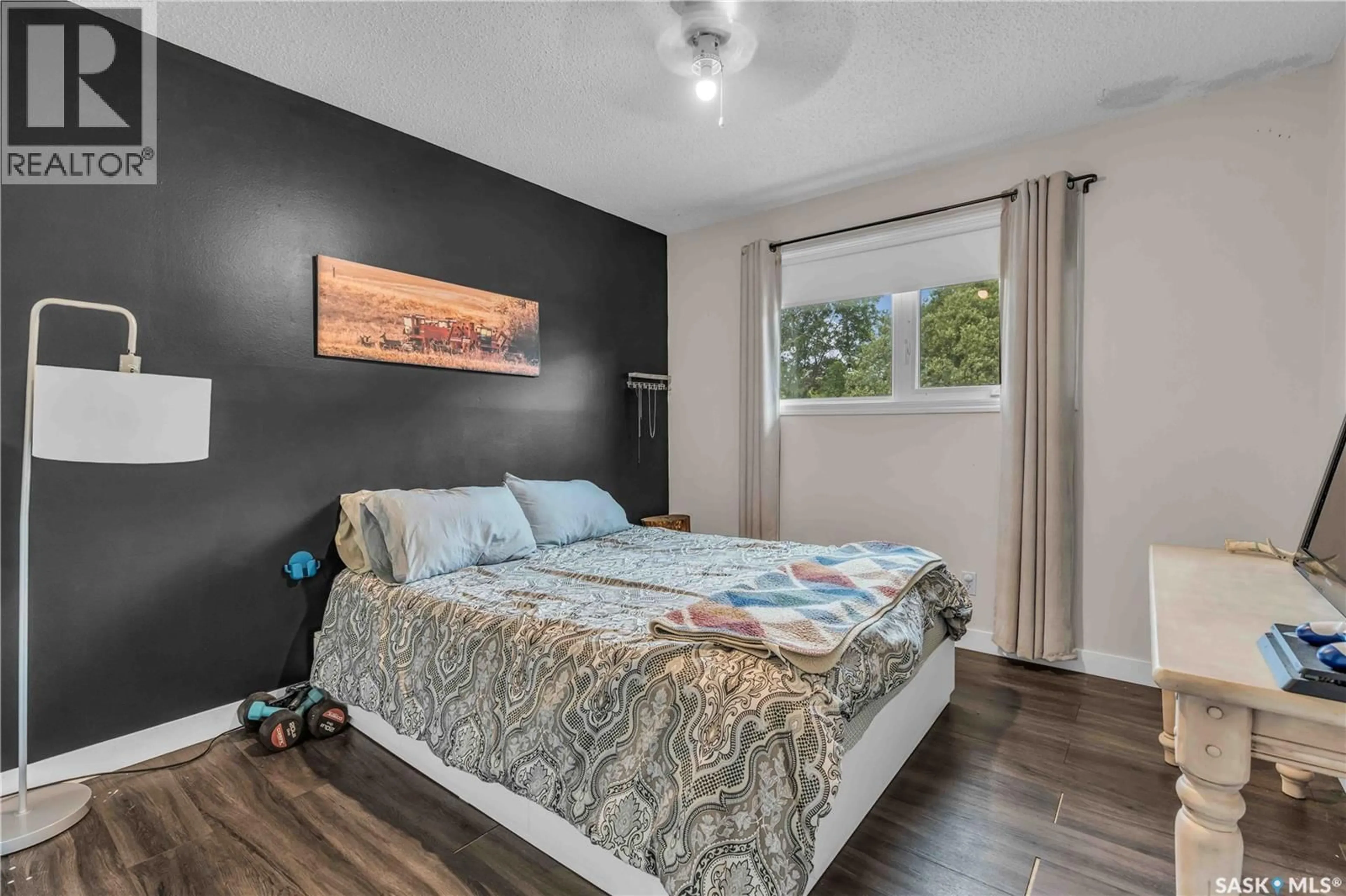 Bedroom with bed, wood/laminate floor for 723 GRID ROAD, Bruno Saskatchewan S0K0S0