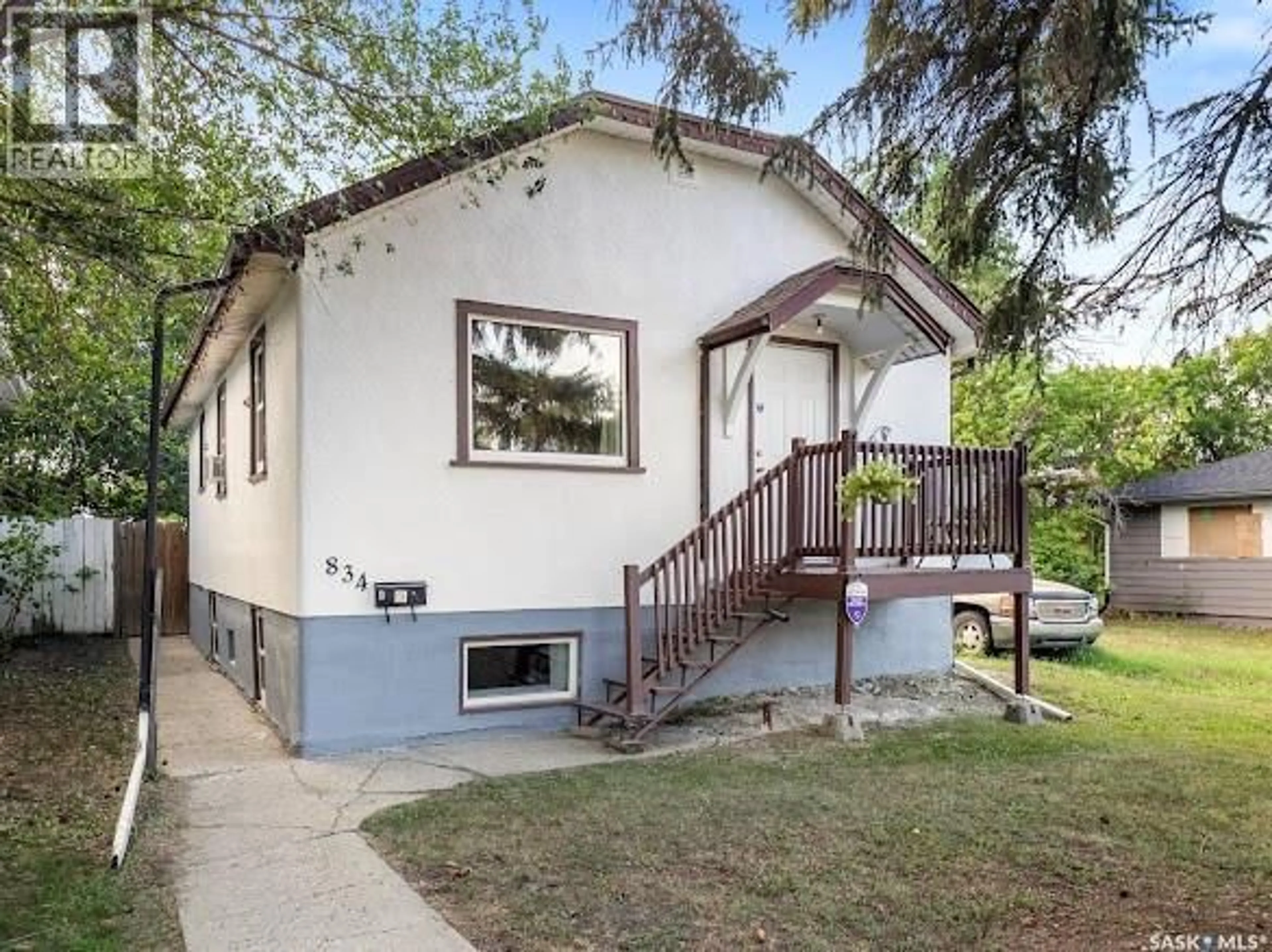 Home with vinyl exterior material, street for 834 RAE STREET, Regina Saskatchewan S4T2B2