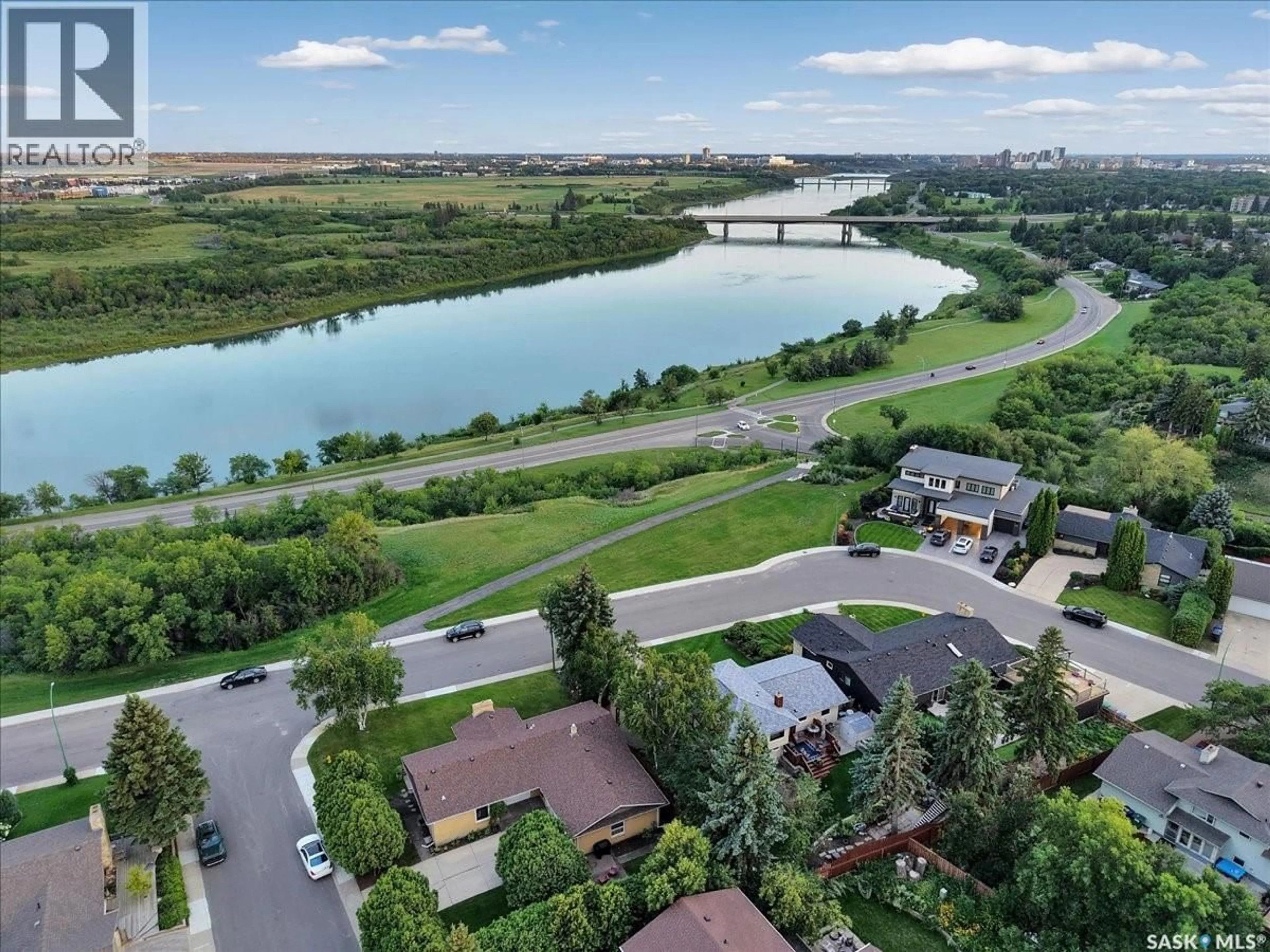 A pic from outside/outdoor area/front of a property/back of a property/a pic from drone, water/lake/river/ocean view for 30 CAPILANO DRIVE, Saskatoon Saskatchewan S7K4A5