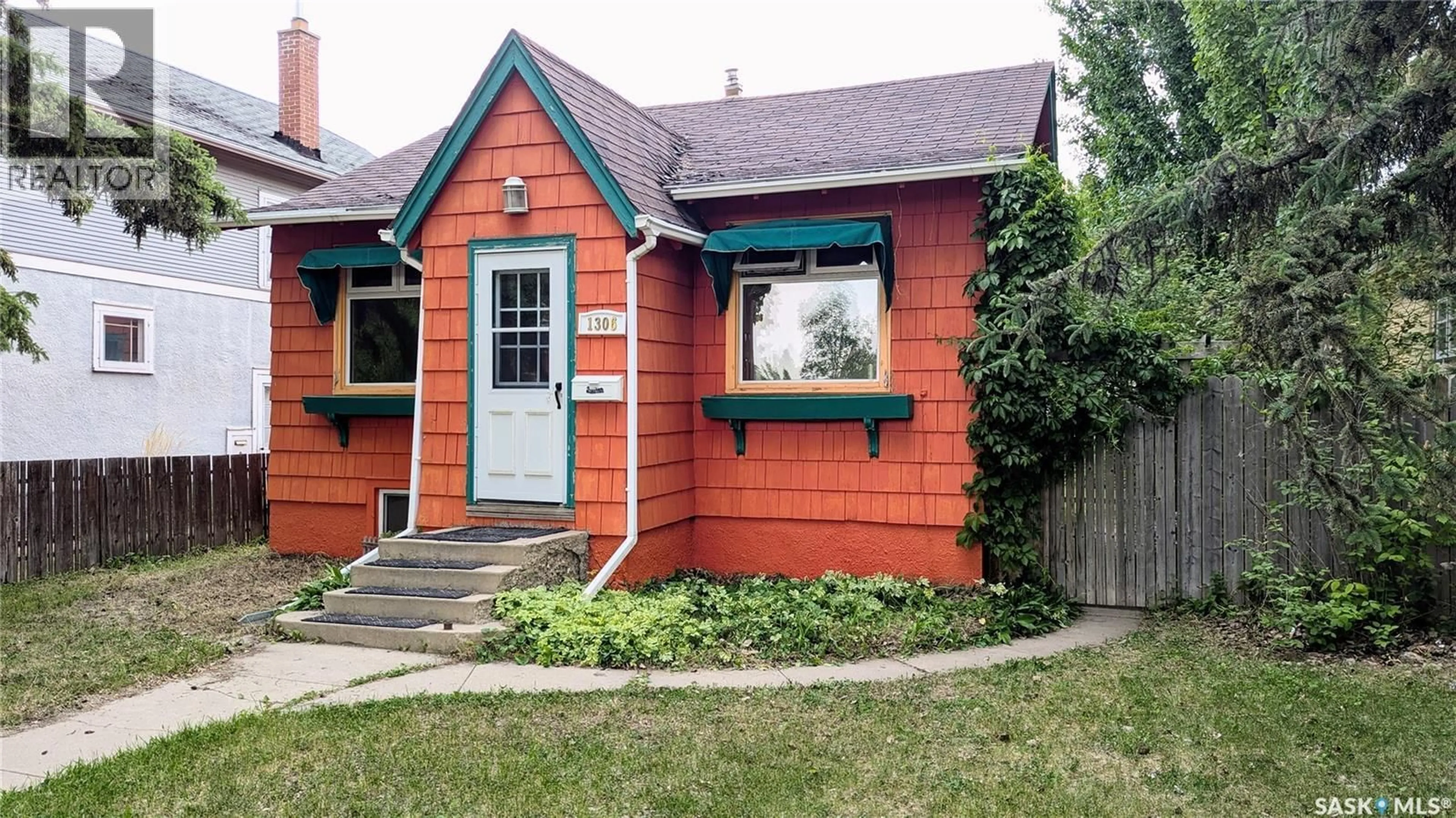 Home with brick exterior material, street for 1306 E AVENUE N, Saskatoon Saskatchewan S7L1T5