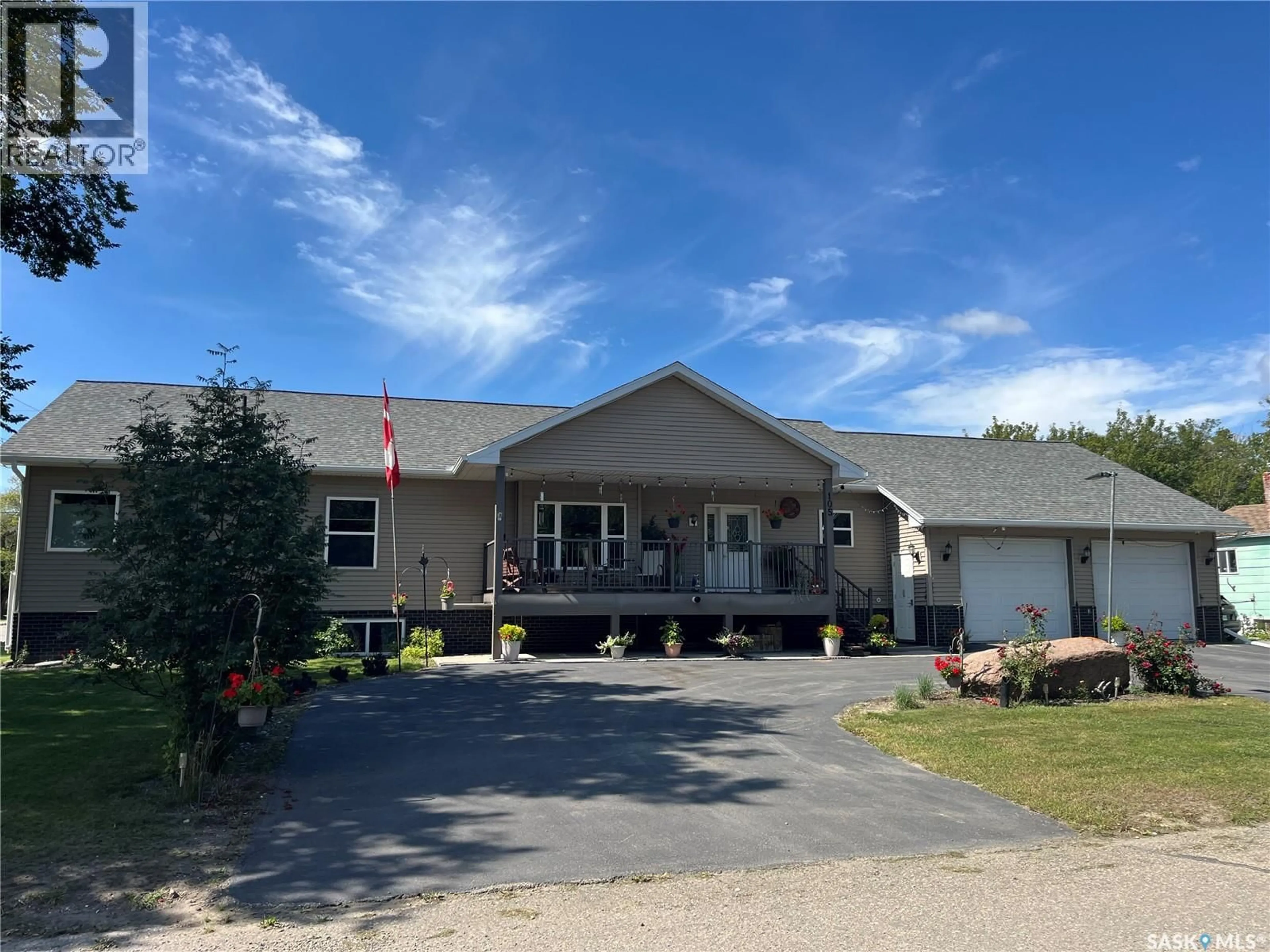 A pic from outside/outdoor area/front of a property/back of a property/a pic from drone, building for 105 JIM HEADINGTON WAY, Wadena Saskatchewan S0A4J0