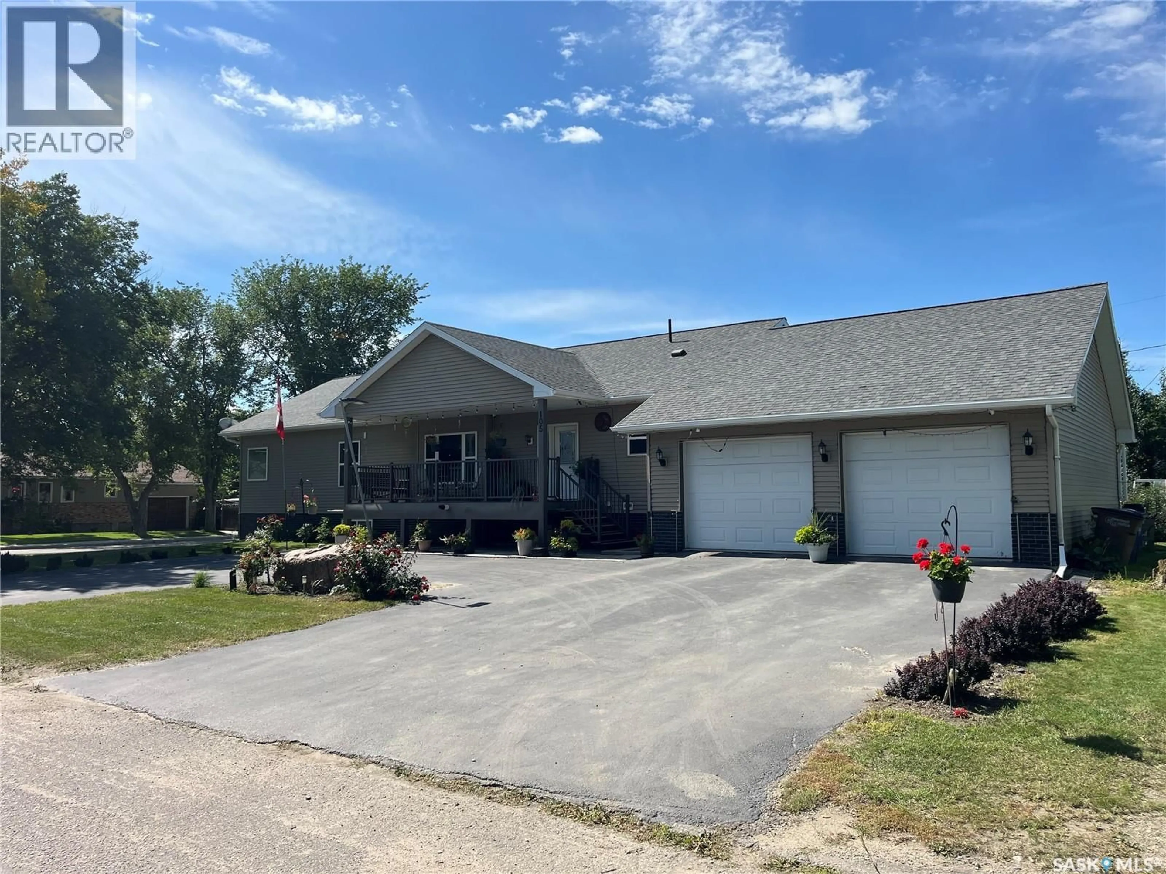 A pic from outside/outdoor area/front of a property/back of a property/a pic from drone, street for 105 JIM HEADINGTON WAY, Wadena Saskatchewan S0A4J0