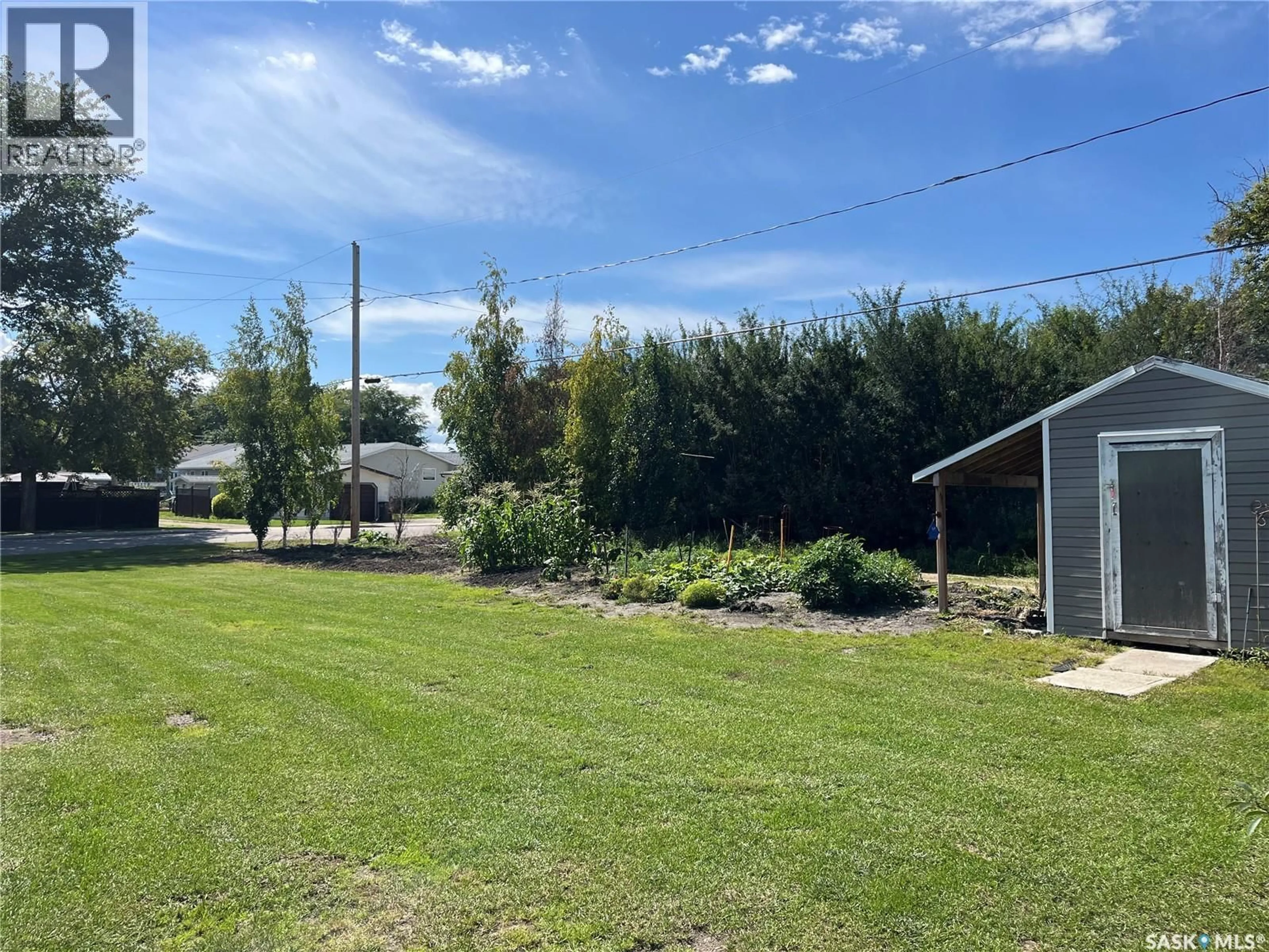 A pic from outside/outdoor area/front of a property/back of a property/a pic from drone, unknown for 105 JIM HEADINGTON WAY, Wadena Saskatchewan S0A4J0