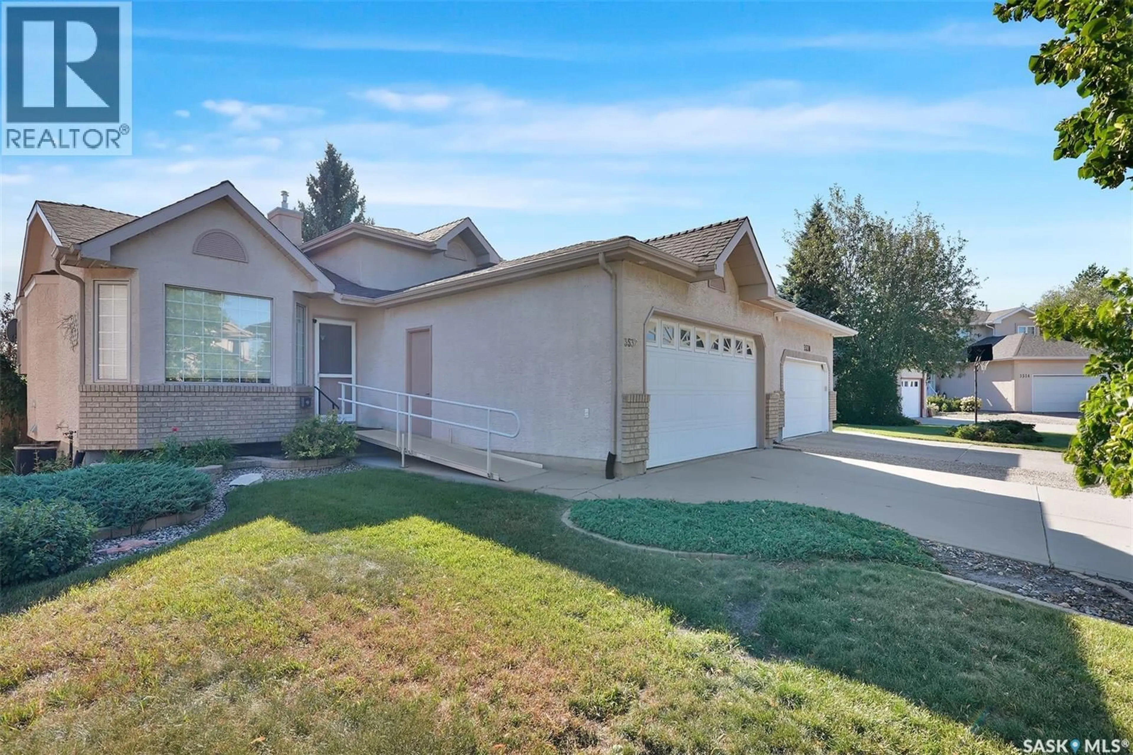 Home with vinyl exterior material, street for 3532 HAZEL GROVE DRIVE, Regina Saskatchewan S4V2S7
