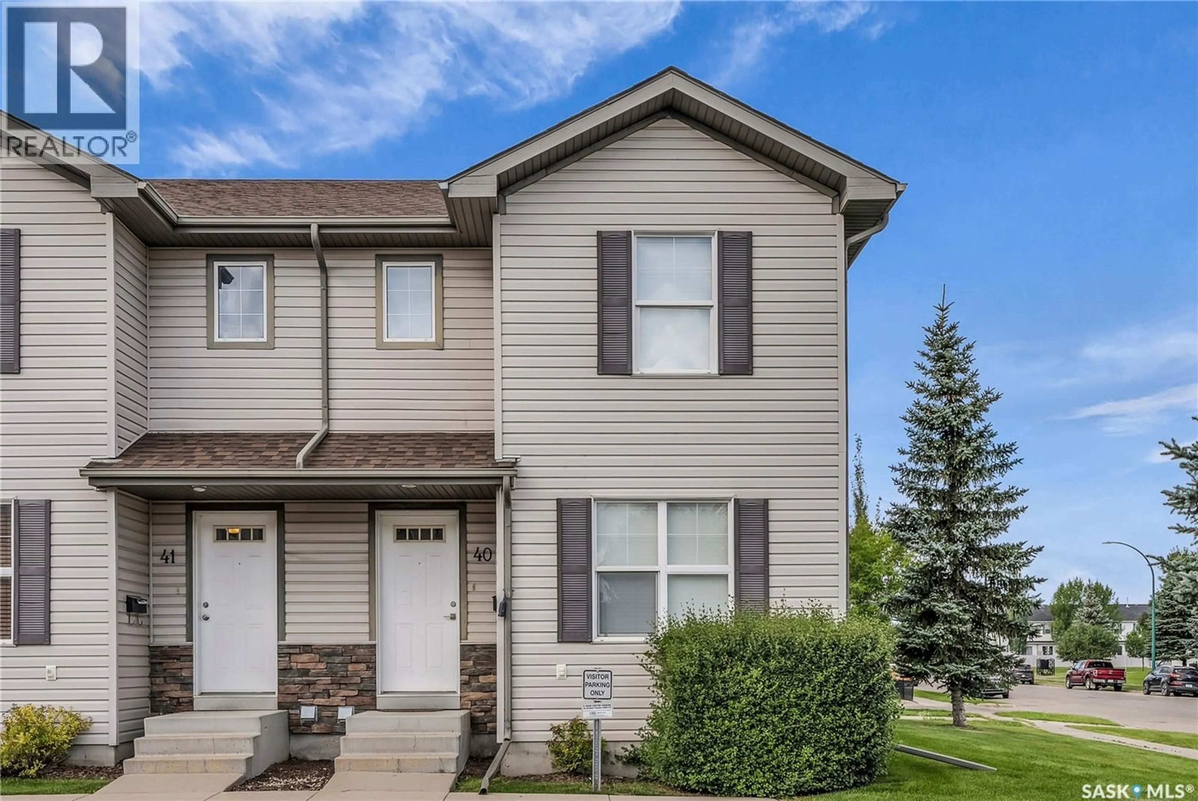 Home with vinyl exterior material, street for 40 135 PAWLYCHENKO LANE, Saskatoon Saskatchewan S7V1K2