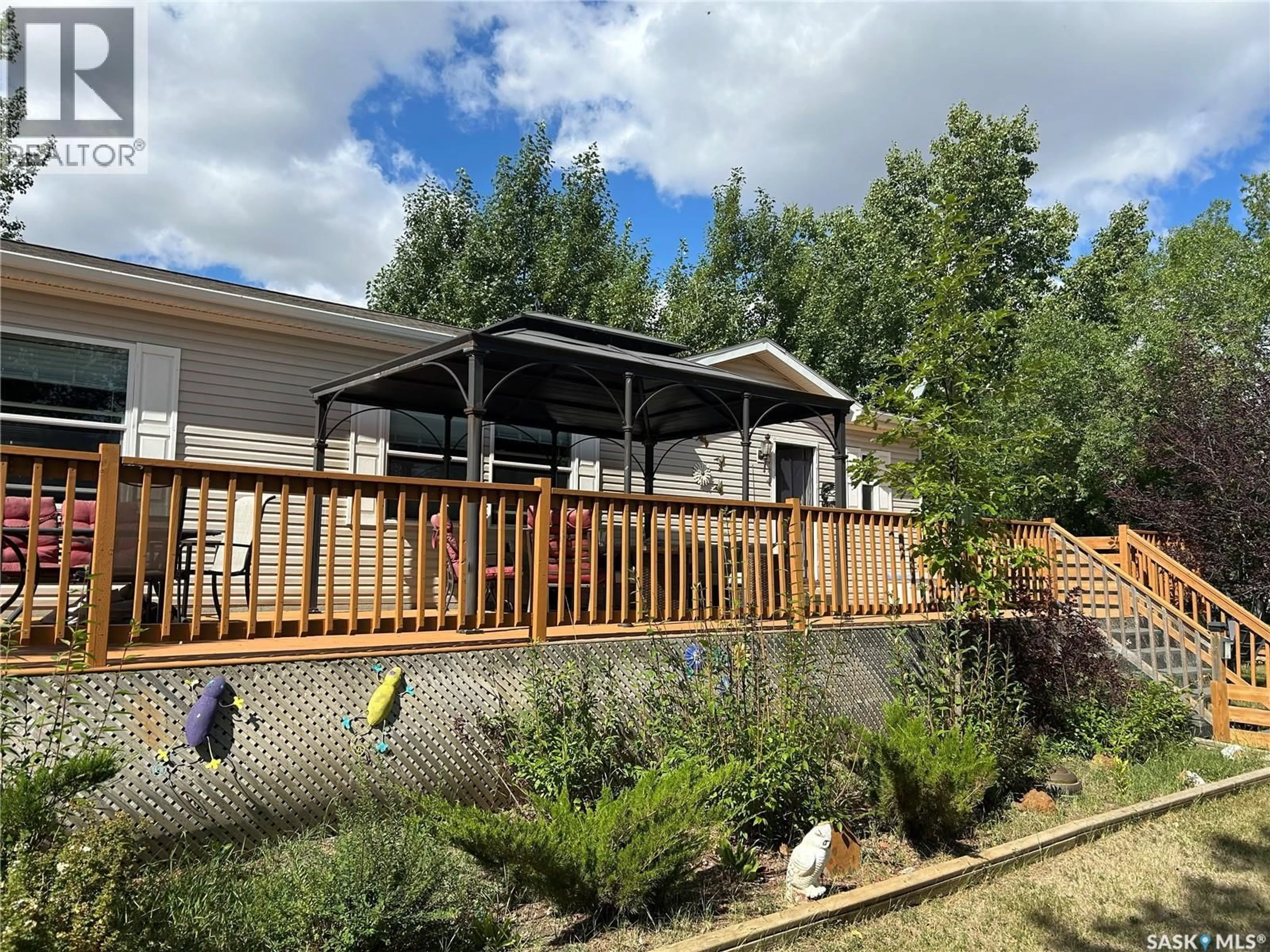 A pic from outside/outdoor area/front of a property/back of a property/a pic from drone, unknown for 12 DOVE DRIVE, Glen Harbour Saskatchewan S0G4L0