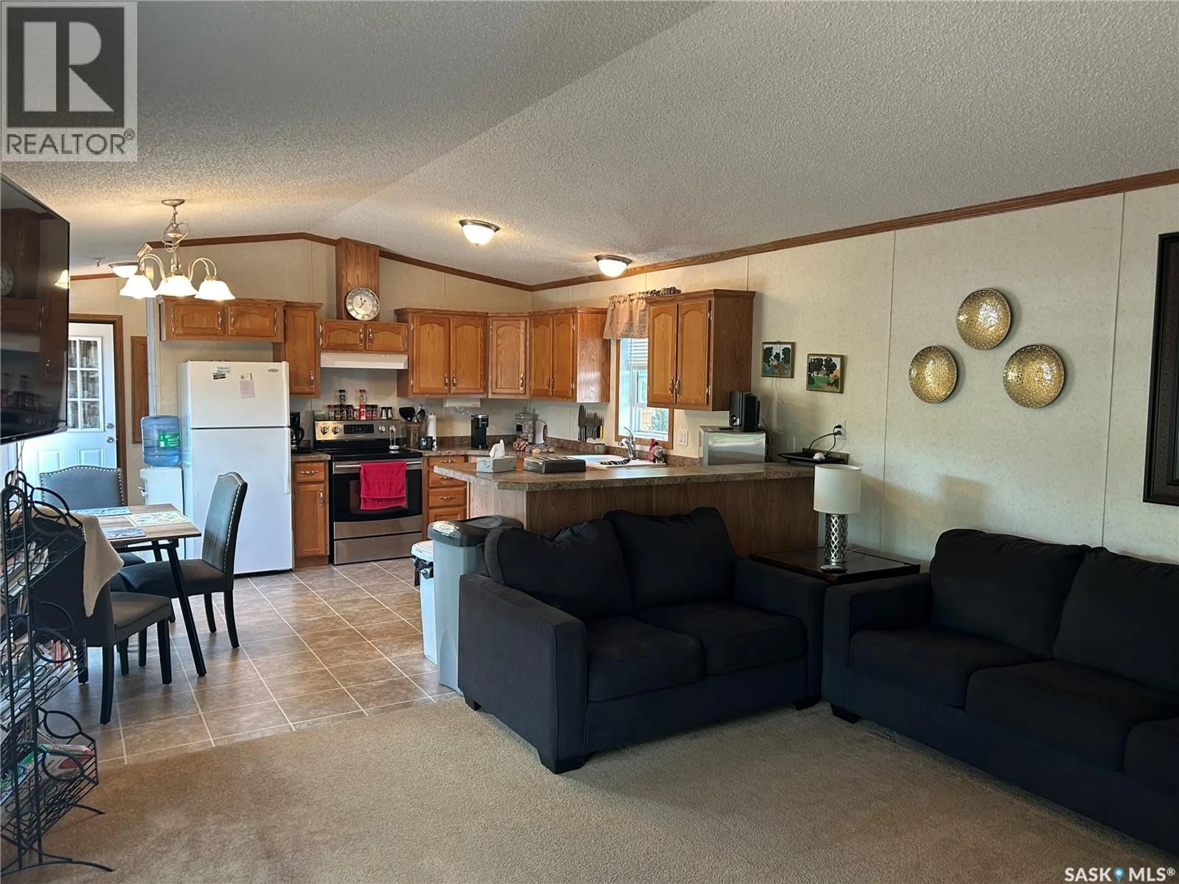 Open concept kitchen, ceramic/tile floor for 12 DOVE DRIVE, Glen Harbour Saskatchewan S0G4L0
