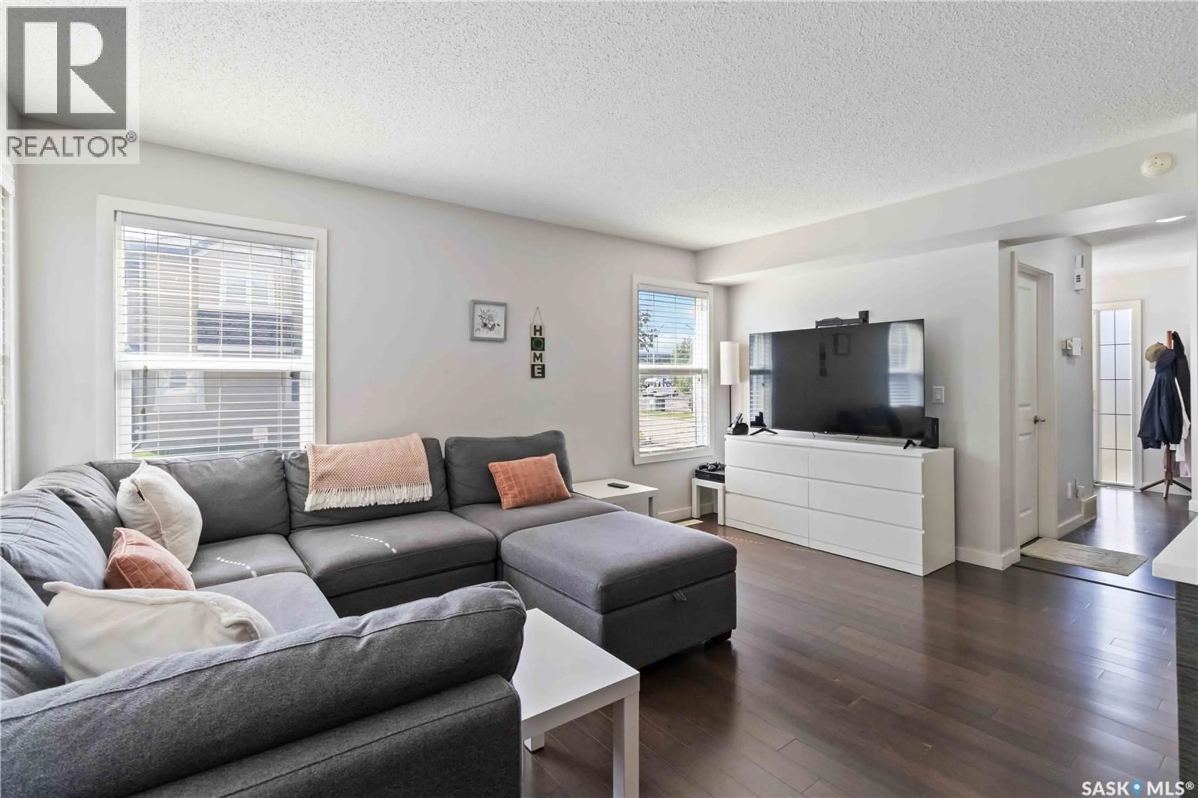 Living room with furniture, unknown for 205 - 410 LEDINGHAM WAY, Saskatoon Saskatchewan S7V0C4