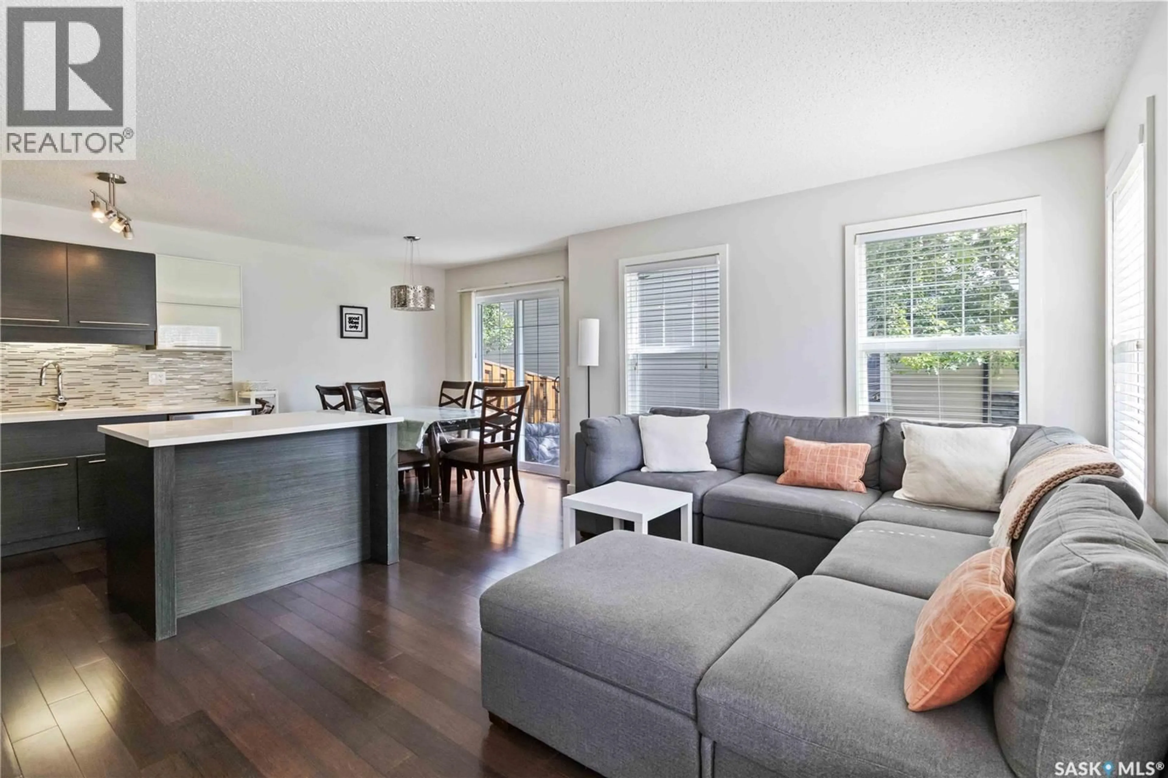 Living room with furniture, unknown for 205 - 410 LEDINGHAM WAY, Saskatoon Saskatchewan S7V0C4