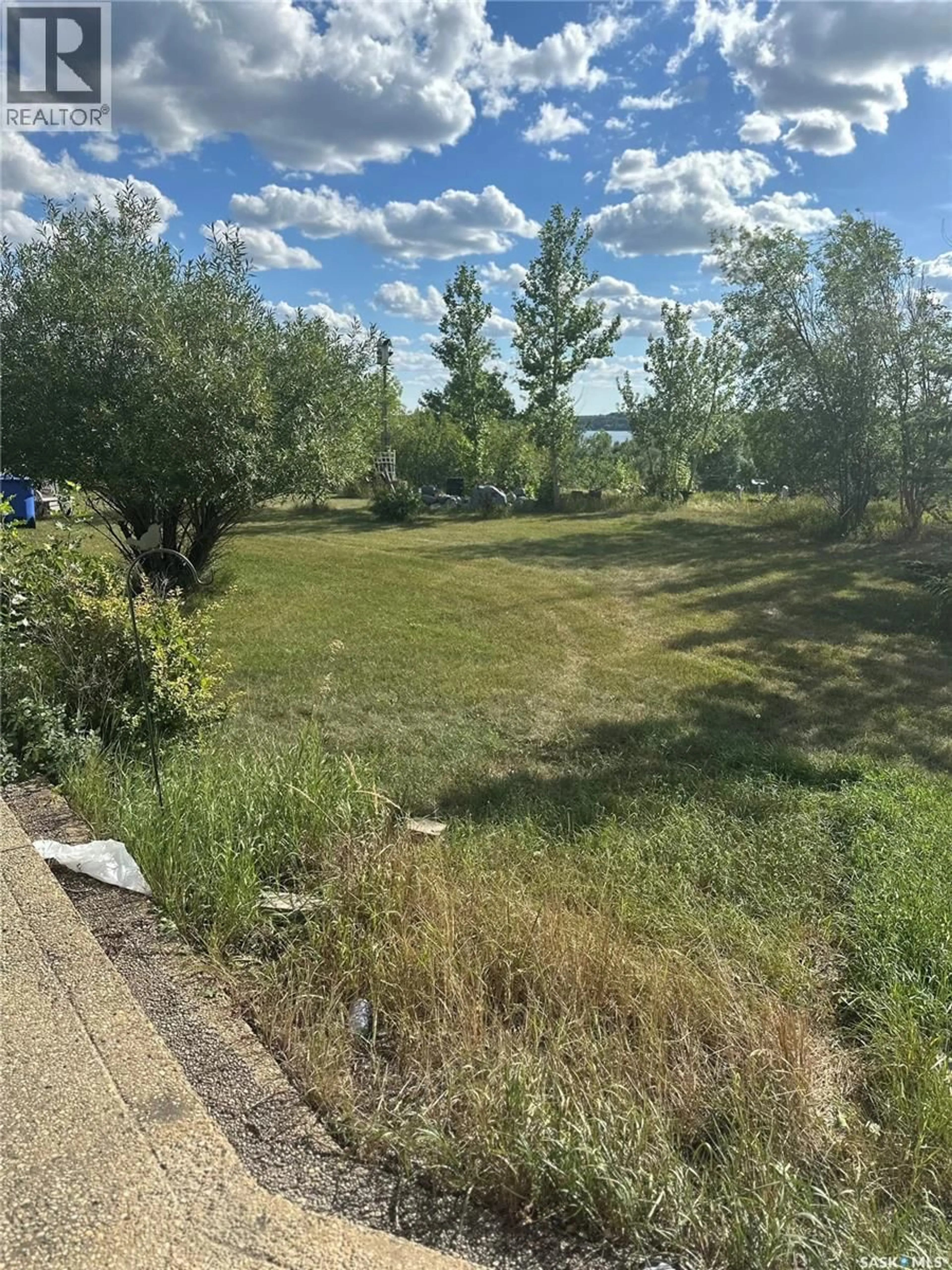 A pic from outside/outdoor area/front of a property/back of a property/a pic from drone, forest/trees view for 3 MEADOWLARK DRIVE, Glen Harbour Saskatchewan S0G4L0