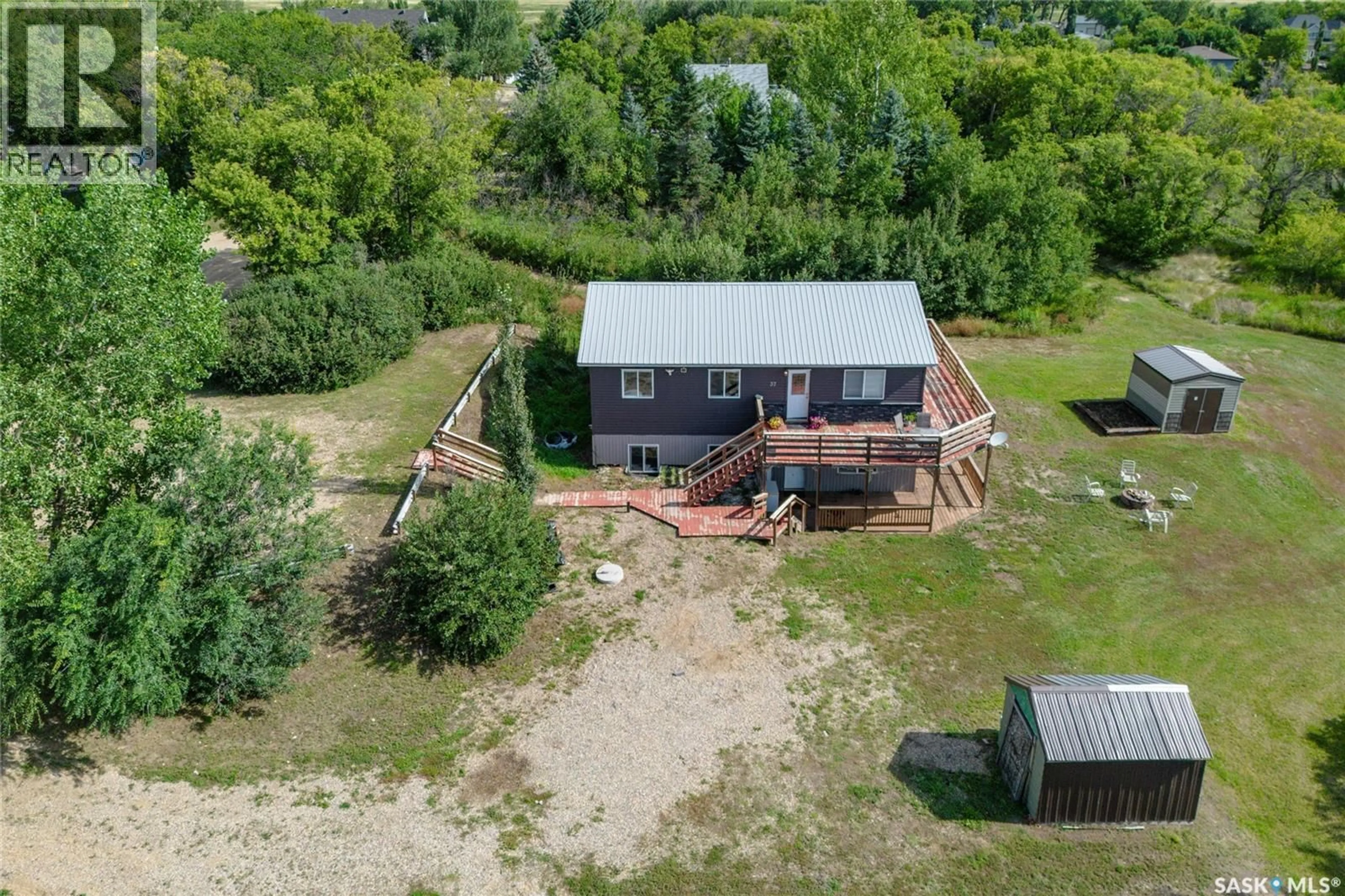 A pic from outside/outdoor area/front of a property/back of a property/a pic from drone, building for 37 PARKBEG STREET, Caron Rm No. 162 Saskatchewan S0H0R0