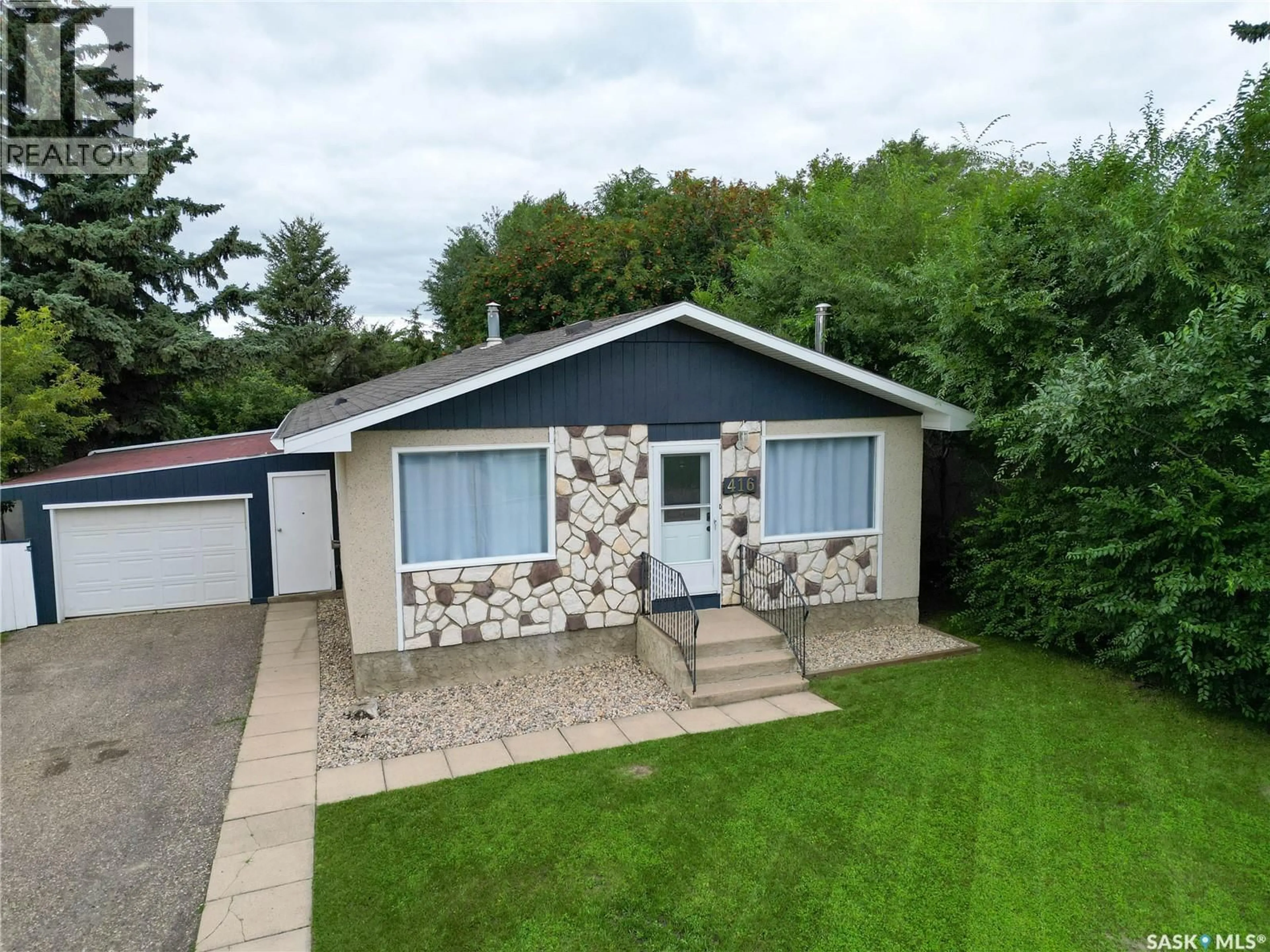 A pic from outside/outdoor area/front of a property/back of a property/a pic from drone, street for 416 30TH STREET, Prince Albert Saskatchewan S6V5V4