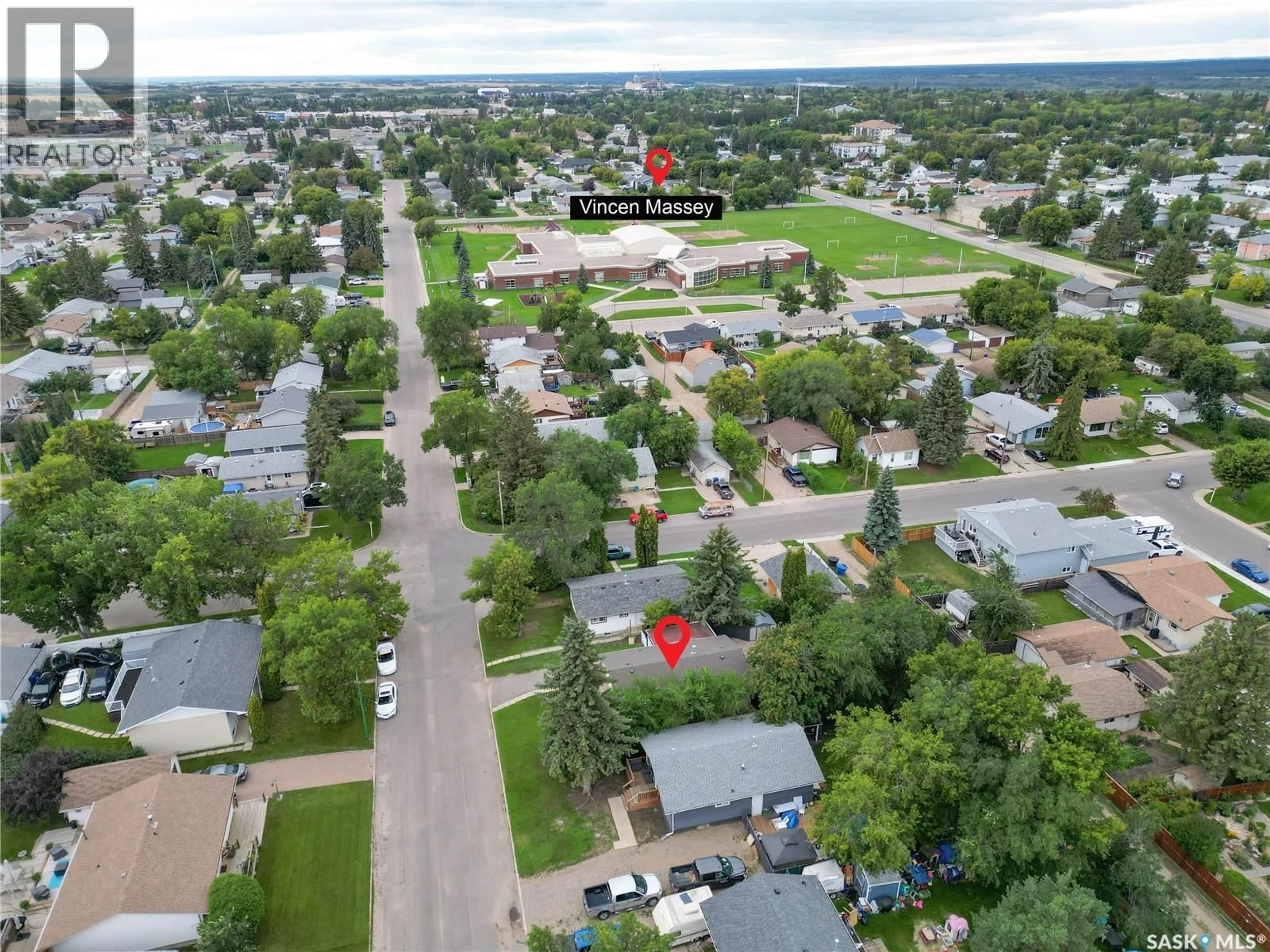 A pic from outside/outdoor area/front of a property/back of a property/a pic from drone, street for 416 30TH STREET, Prince Albert Saskatchewan S6V5V4