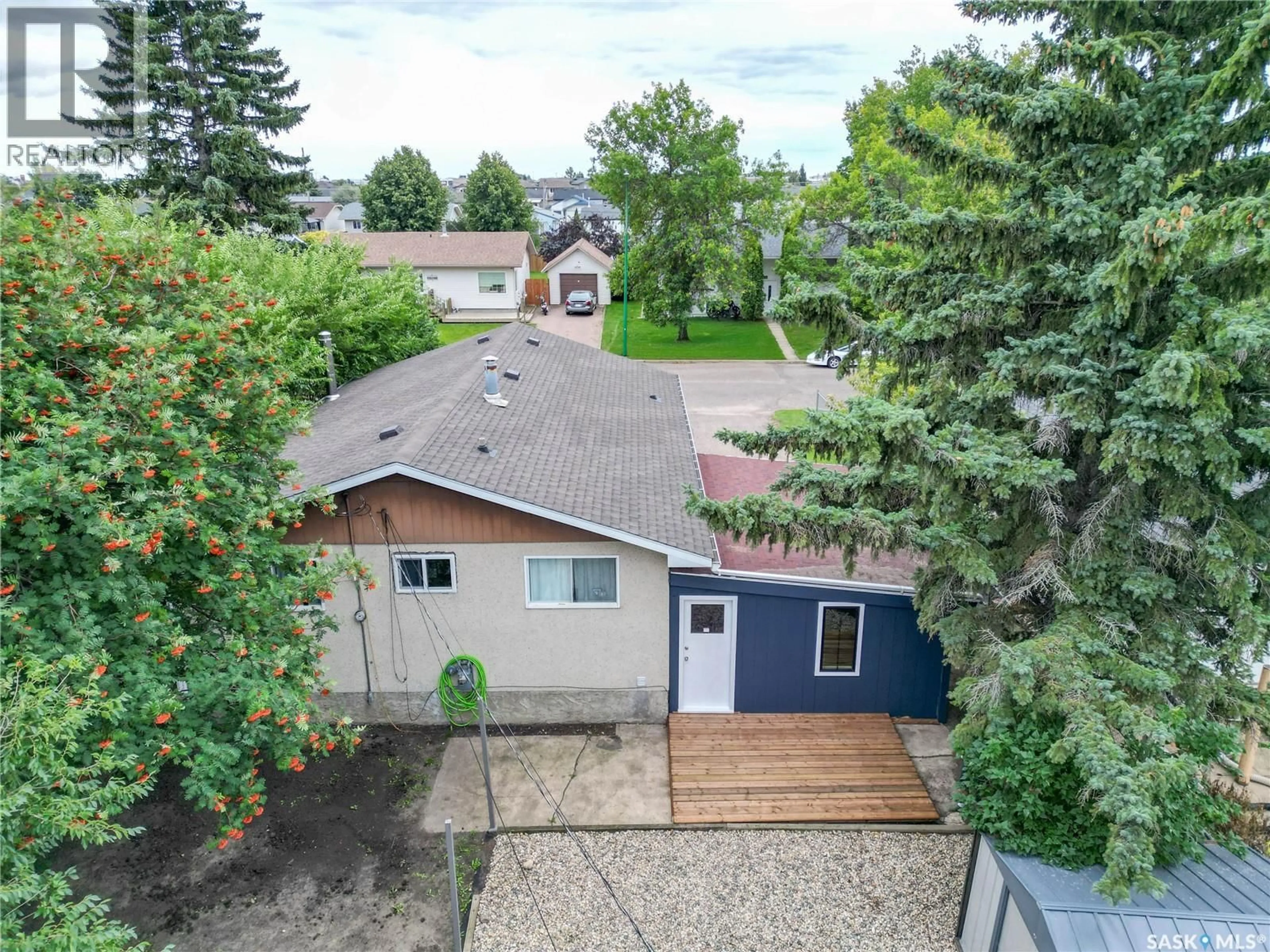 A pic from outside/outdoor area/front of a property/back of a property/a pic from drone, street for 416 30TH STREET, Prince Albert Saskatchewan S6V5V4