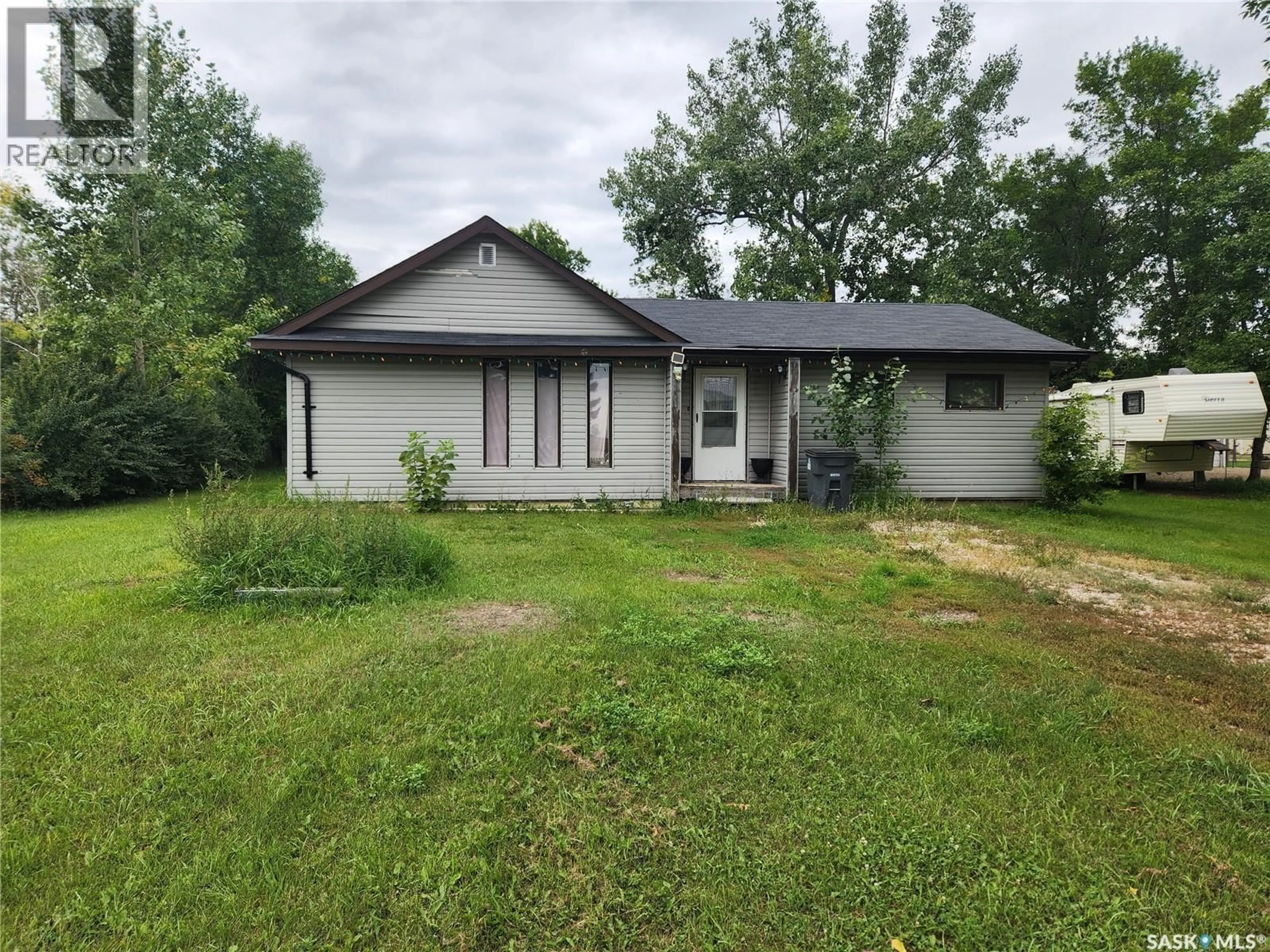 A pic from outside/outdoor area/front of a property/back of a property/a pic from drone, street for 510 EISENHOWER STREET, Midale Saskatchewan S0C1S0