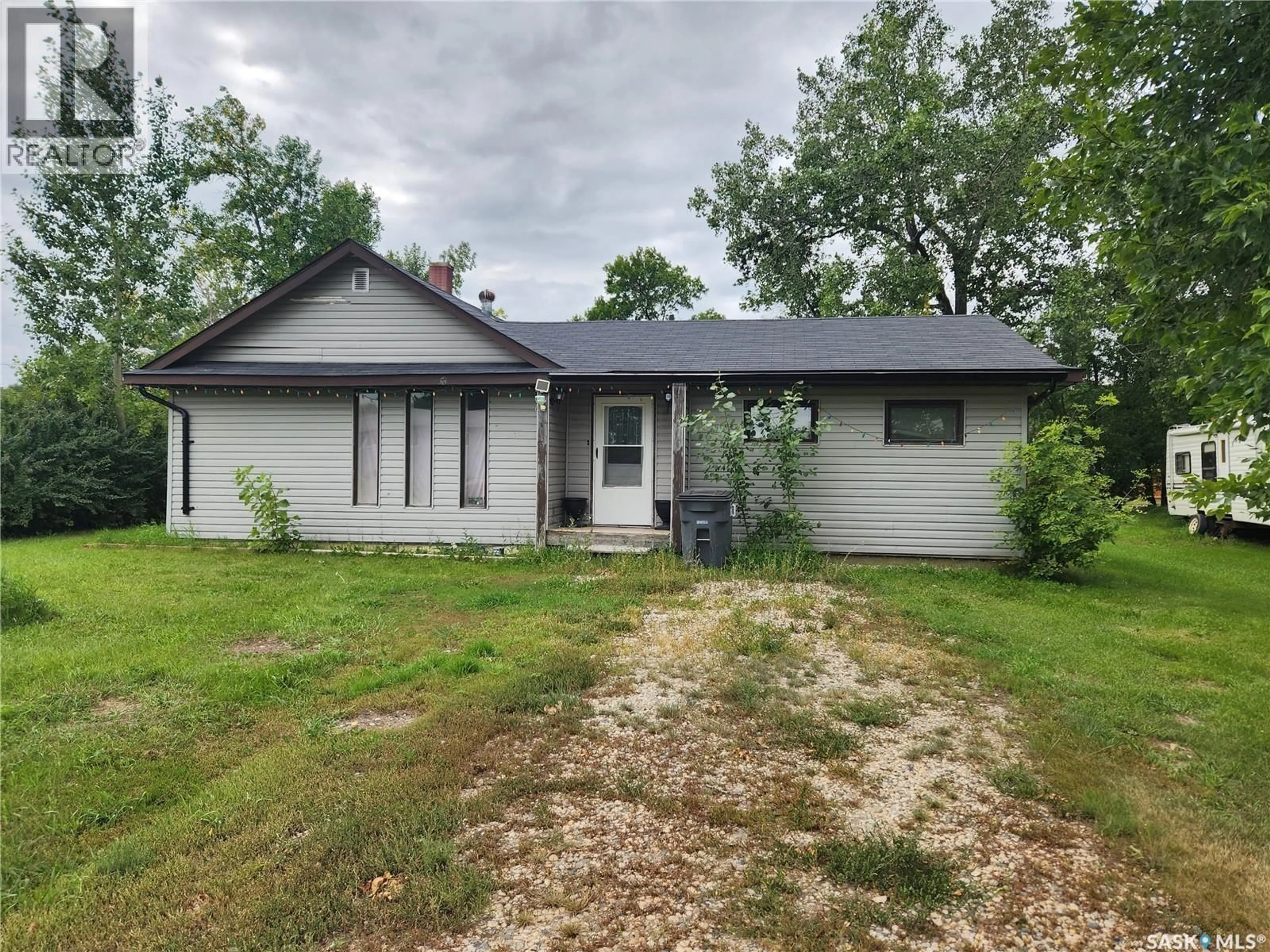 A pic from outside/outdoor area/front of a property/back of a property/a pic from drone, unknown for 510 EISENHOWER STREET, Midale Saskatchewan S0C1S0